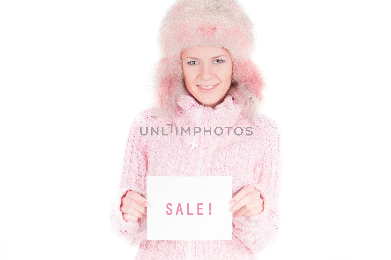 Beautiful woman in pink fur hat, isolated on white