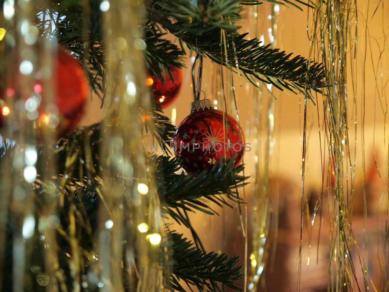 Beautiful hanging Christmas decorations ornaments on a tree    