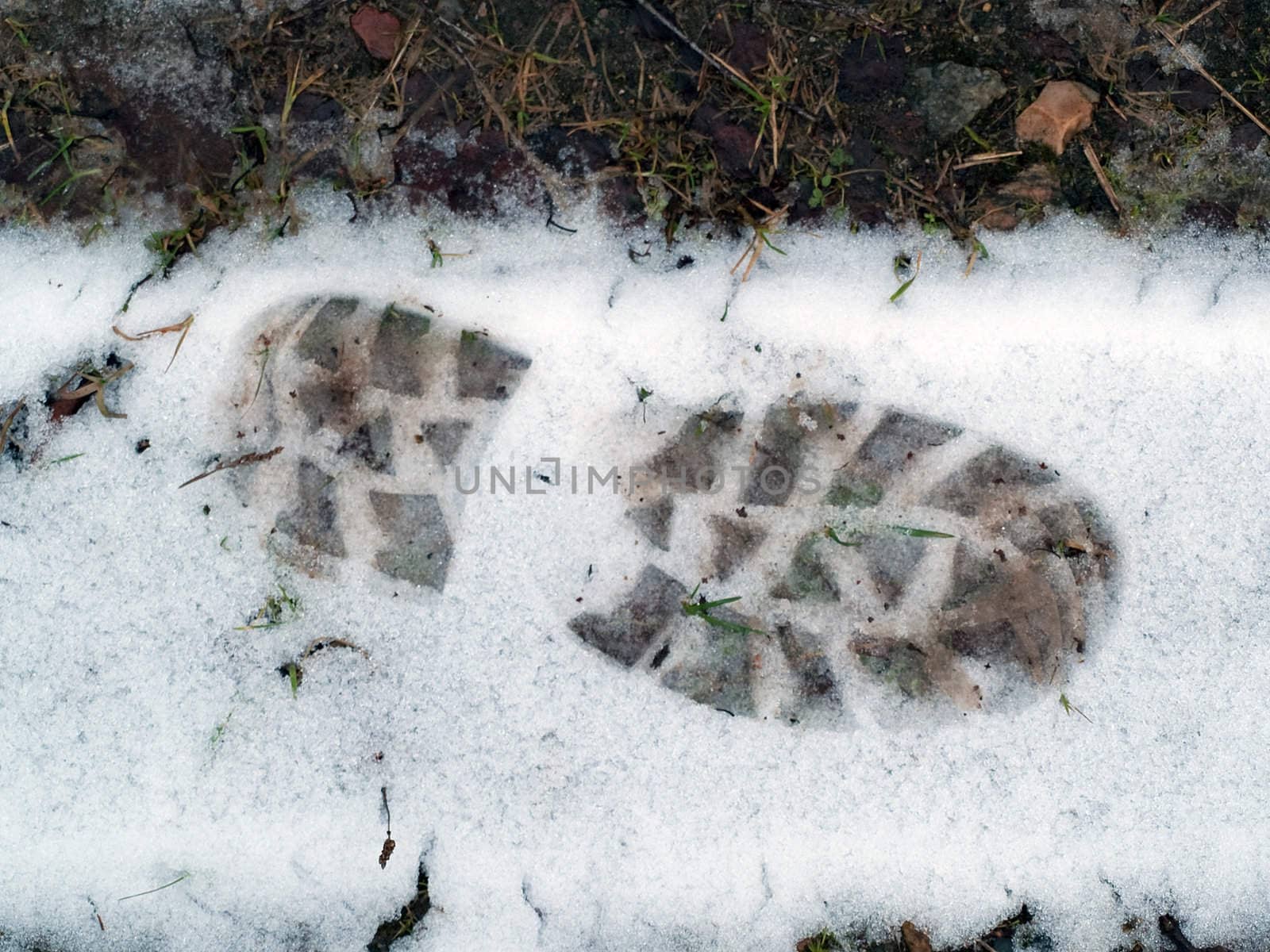 Winter background Tracks footprint in the snow