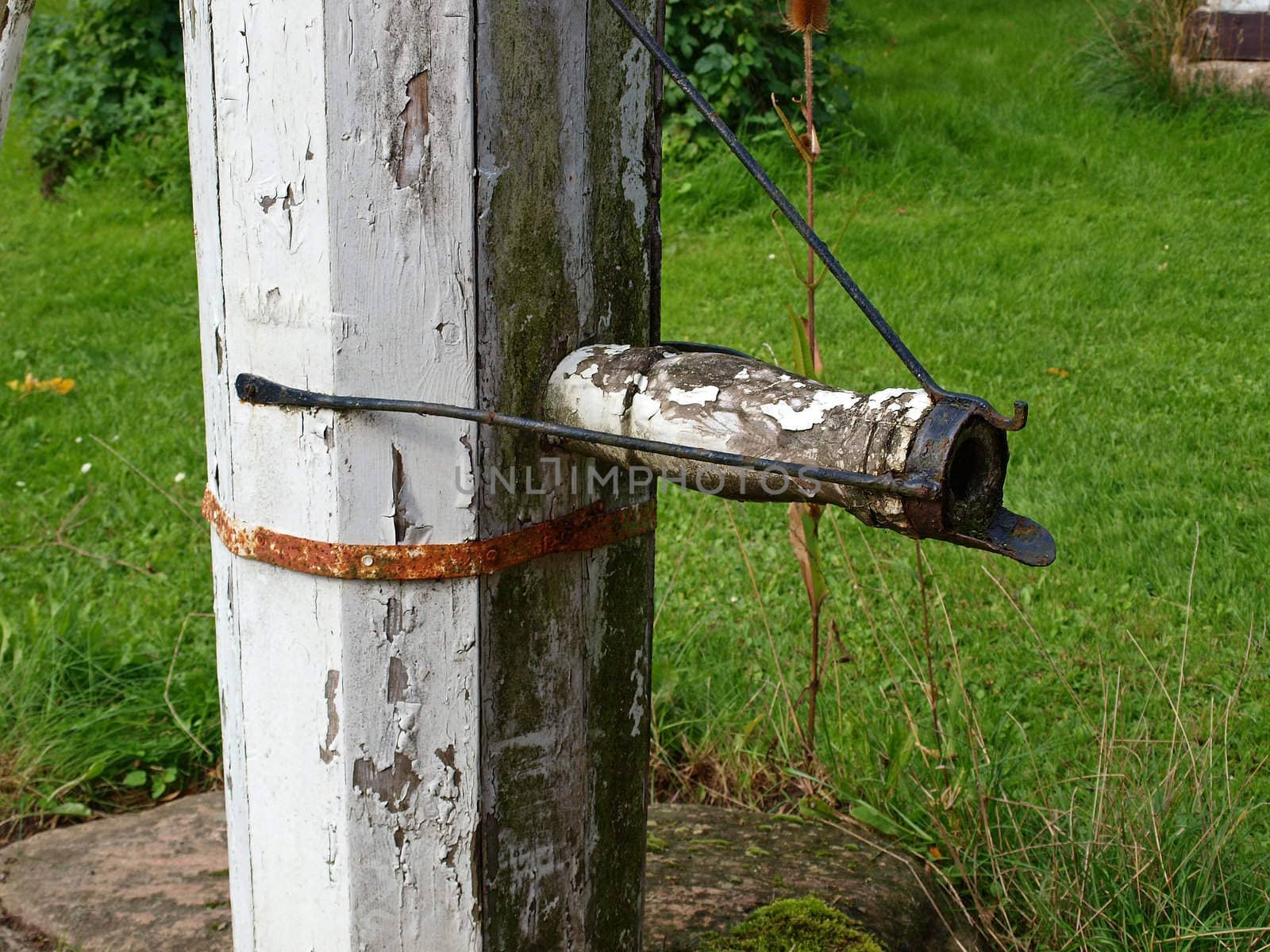 Old vintage well water pump in village Denmark   