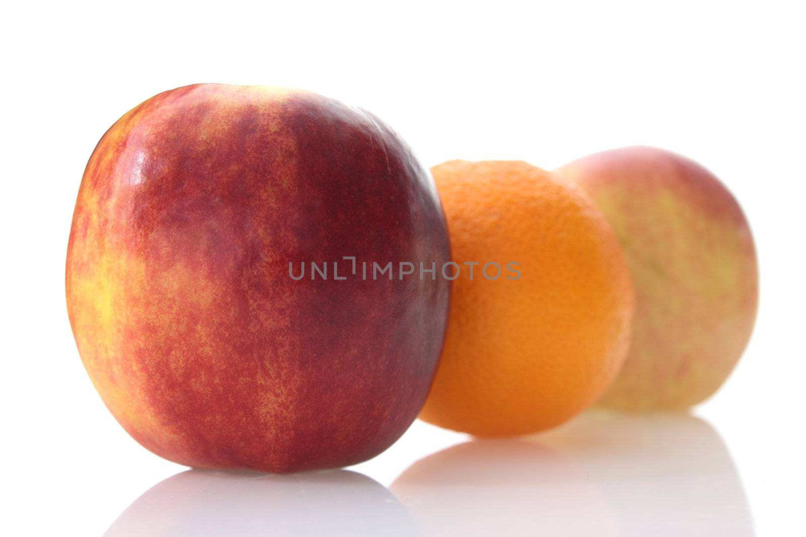 Apples and orange isolated on white