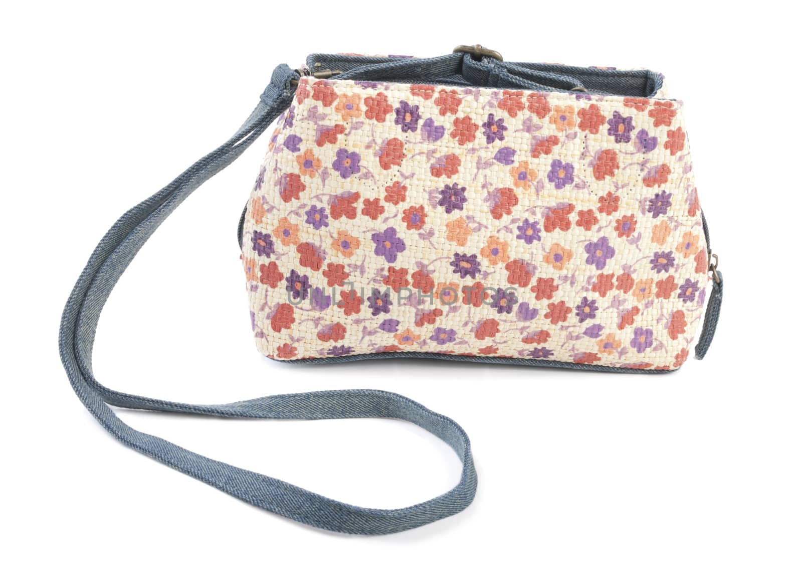 Textile female bag with floral ornament. Isolated on white background