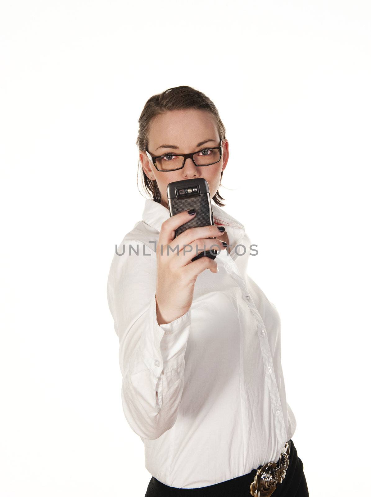 Beautiful girl text messaging, seen against white background