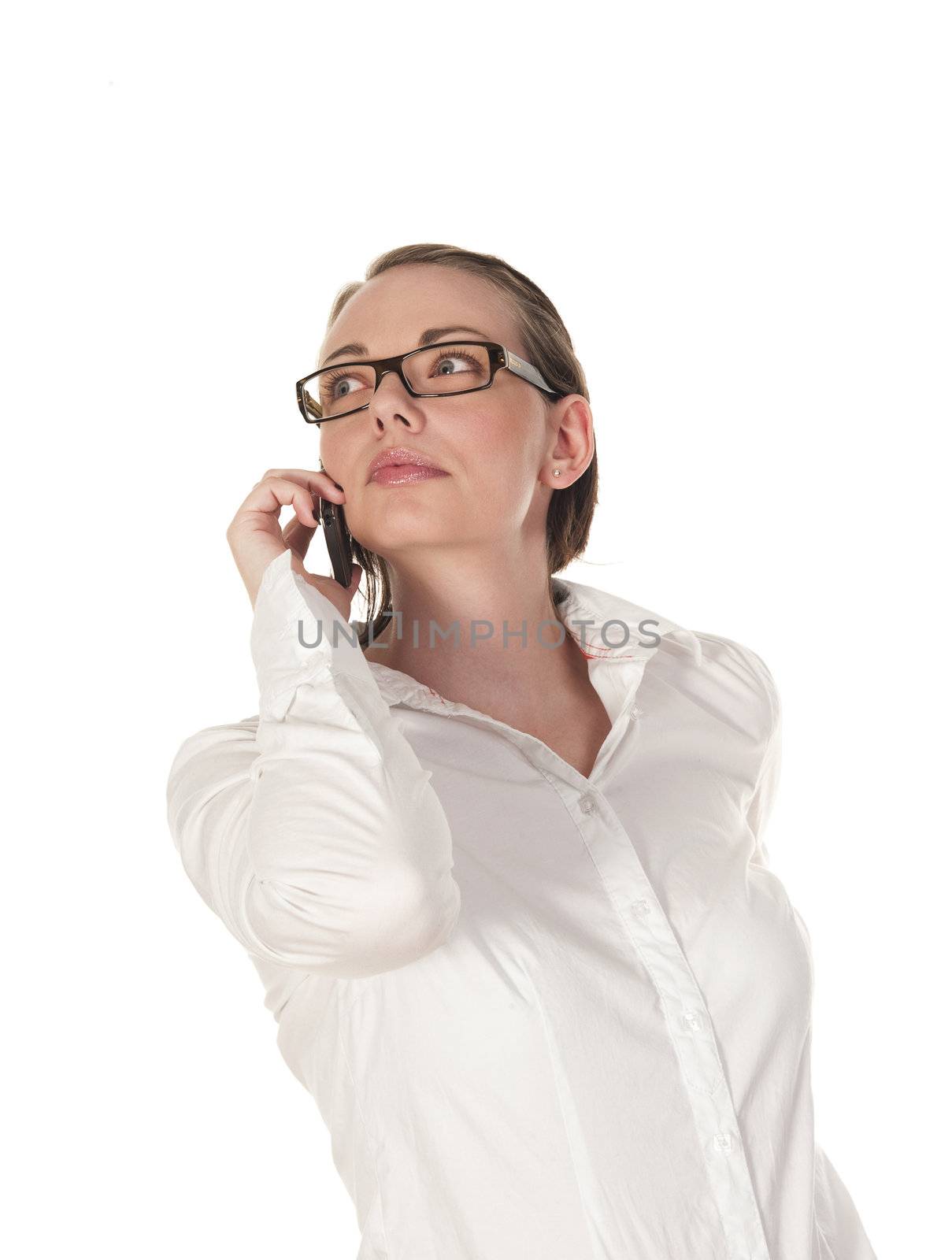 beautiful girl listening intensely to the telephone, seen against white background