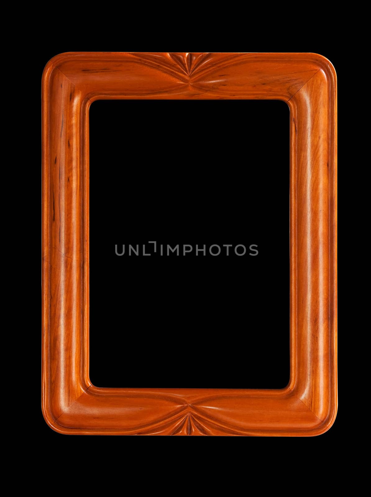 Isolated teak colored carved picture frame against black