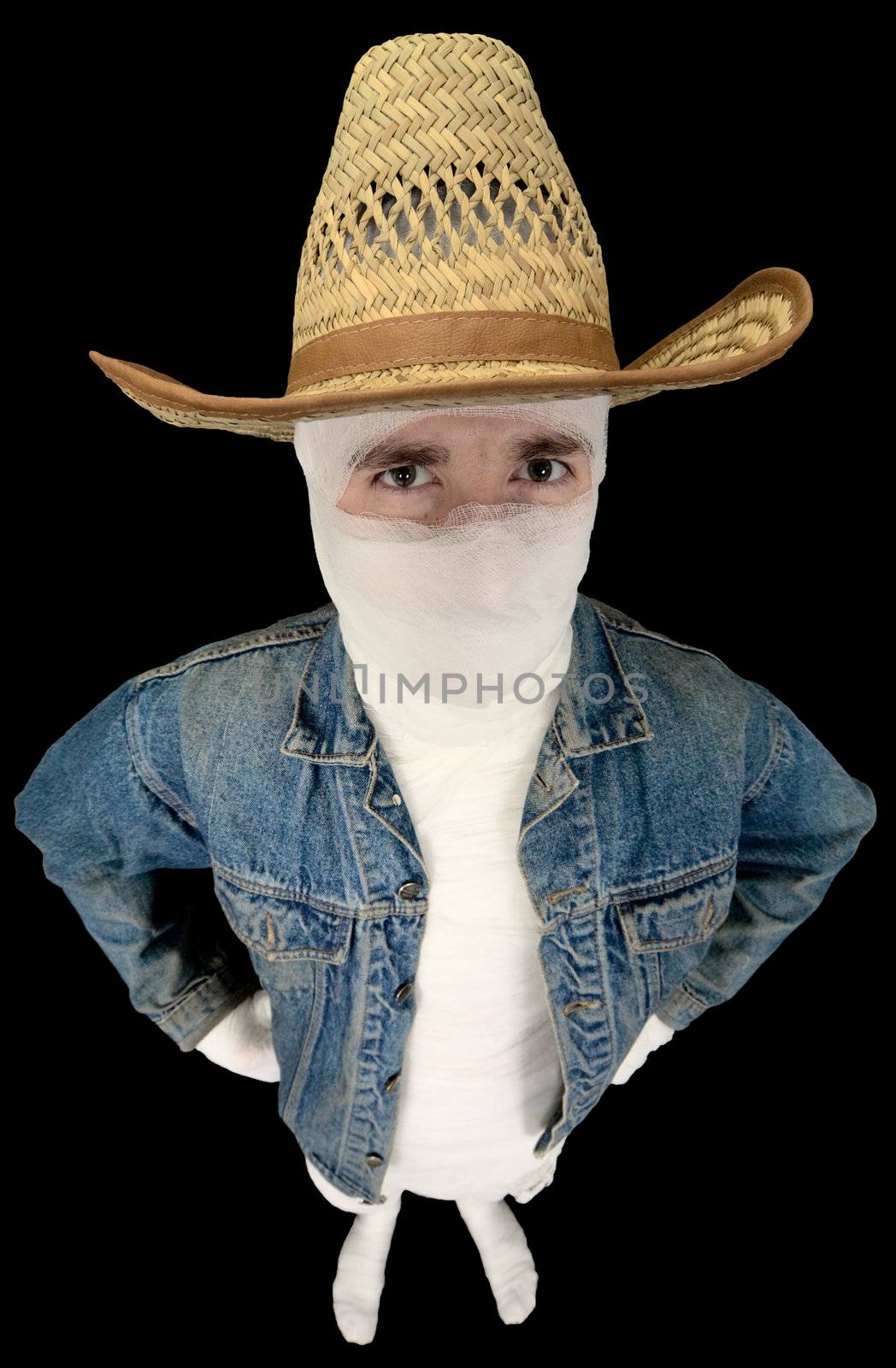 Portrait of totally bandaged cowboy with a hat on