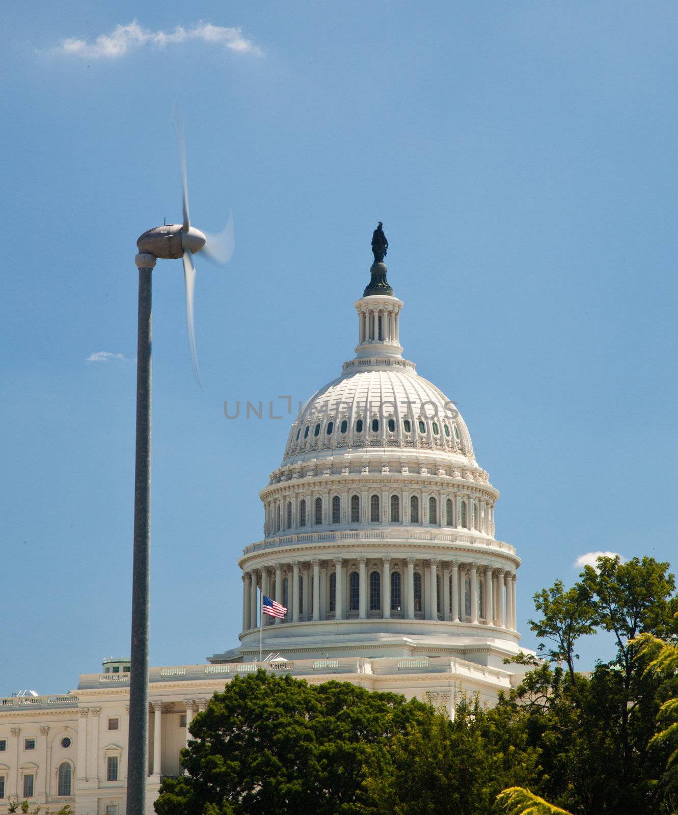 Capitol Building framed by wind turbine by steheap