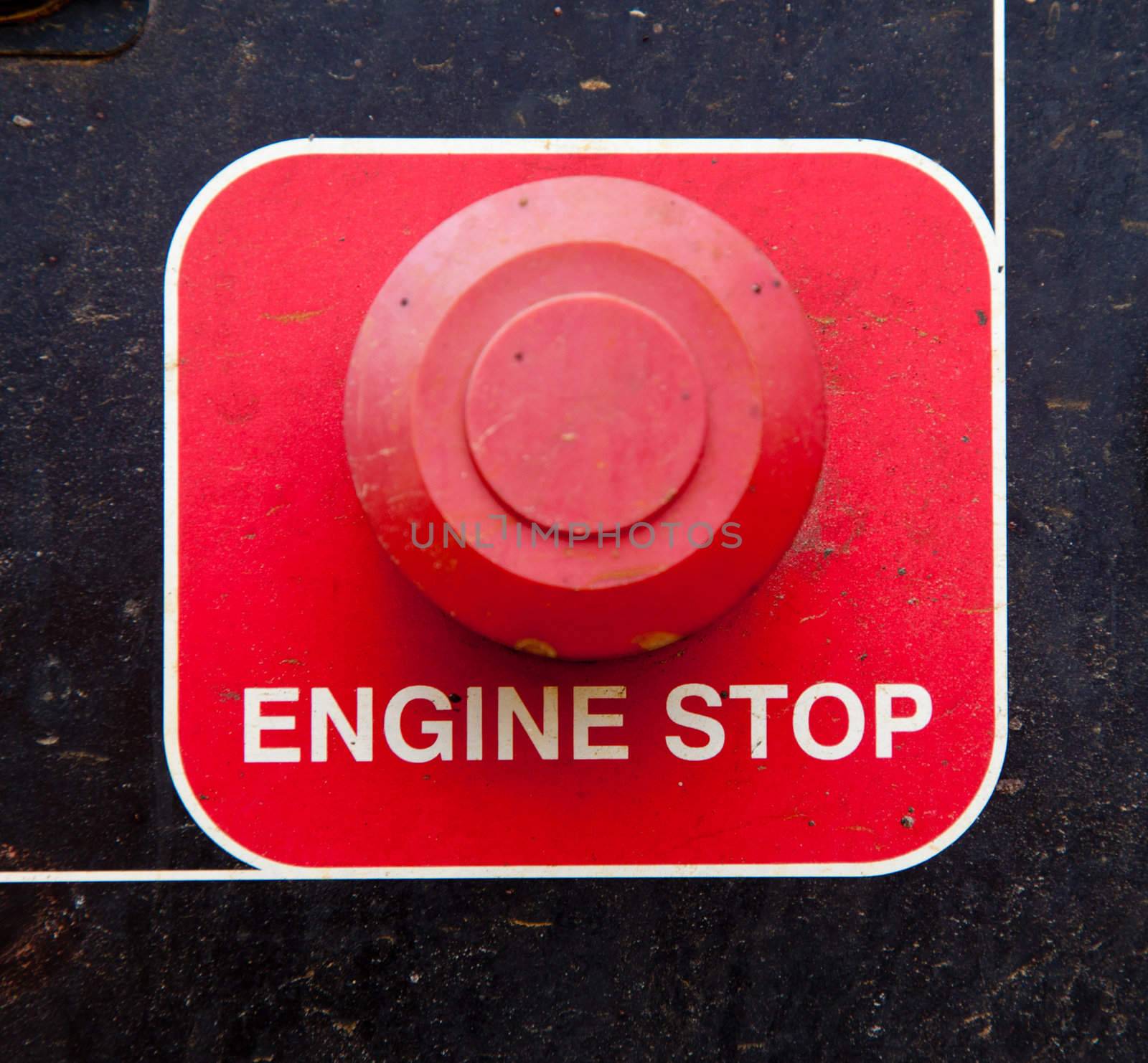 Engine stop button on heavy machinery