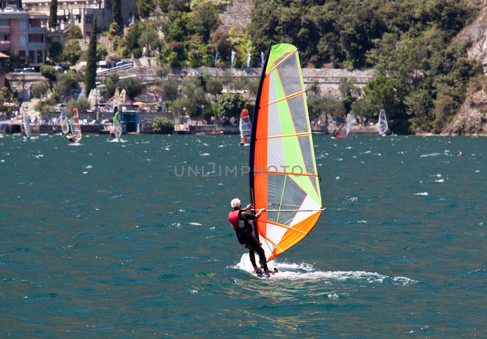 Windsurfer shot against the light on Lake Garda in Italy