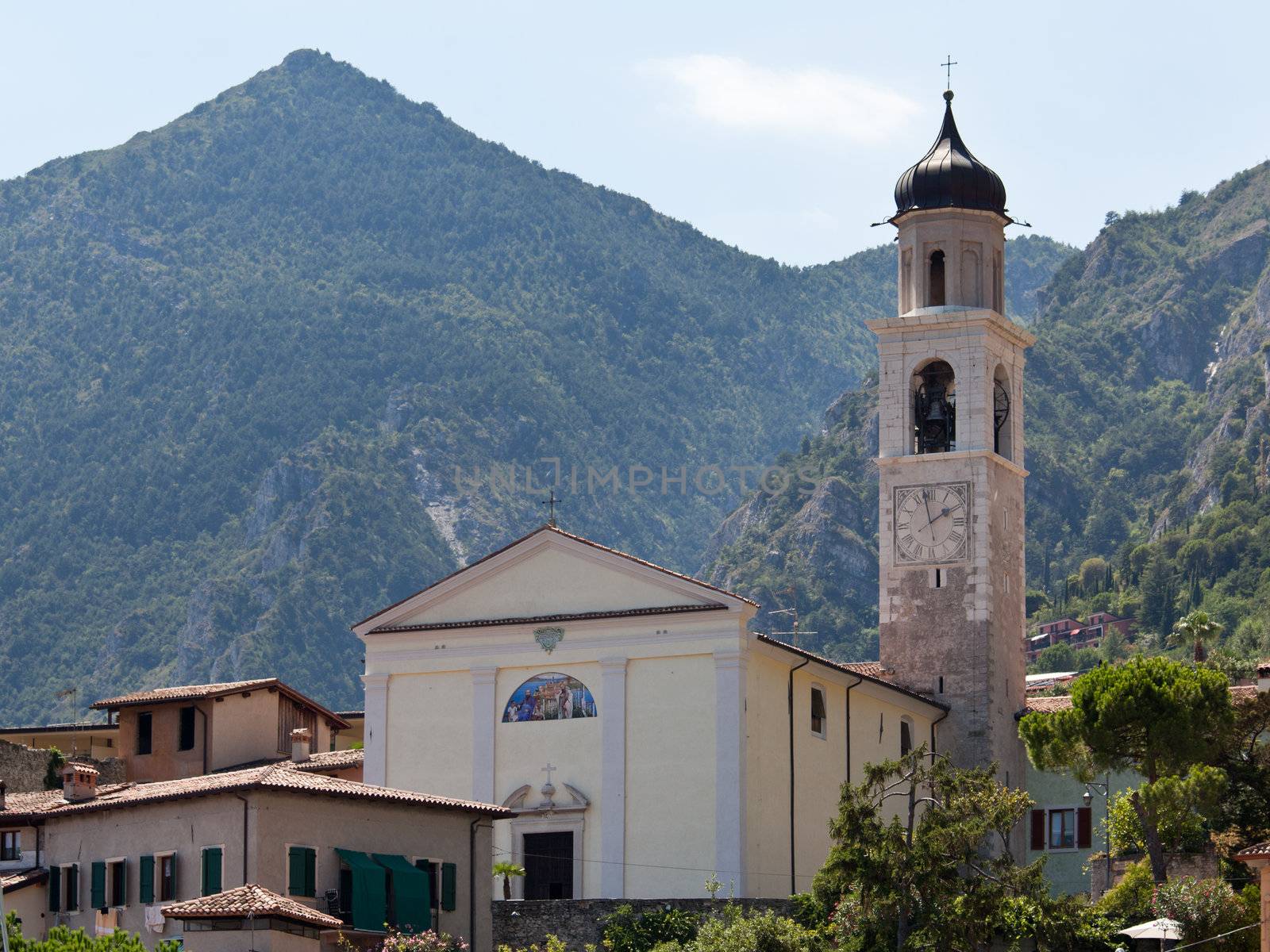 Flowers frame the rooftops of Limone on Lake Garda Italy