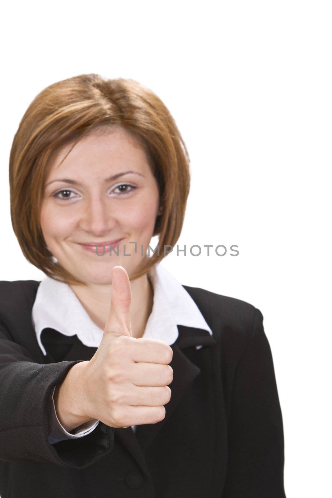 Happy businesswoman with thumb up.Selective focus on the thumb.