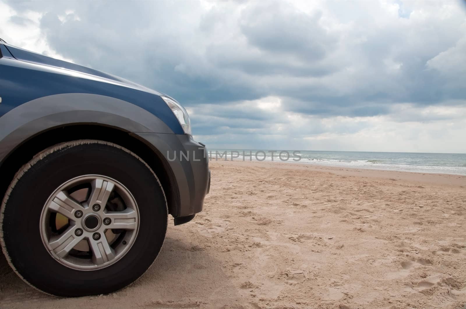 The front of a car watching the sea