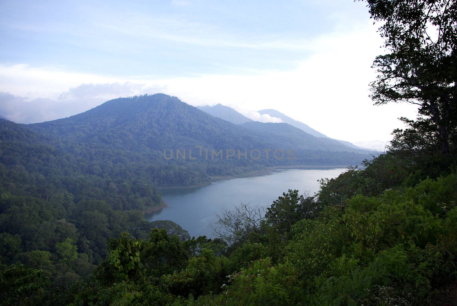 It's a view on one of four big lakes of Bali island, with lots of tropical forest