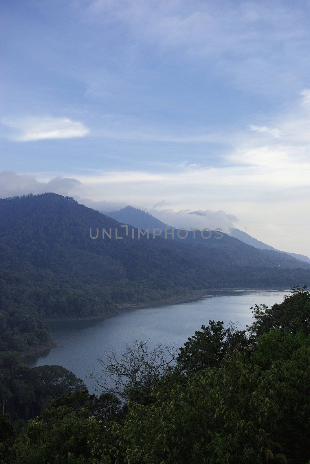 It's a view on one of four big lakes of Bali island, with lots of tropical forest