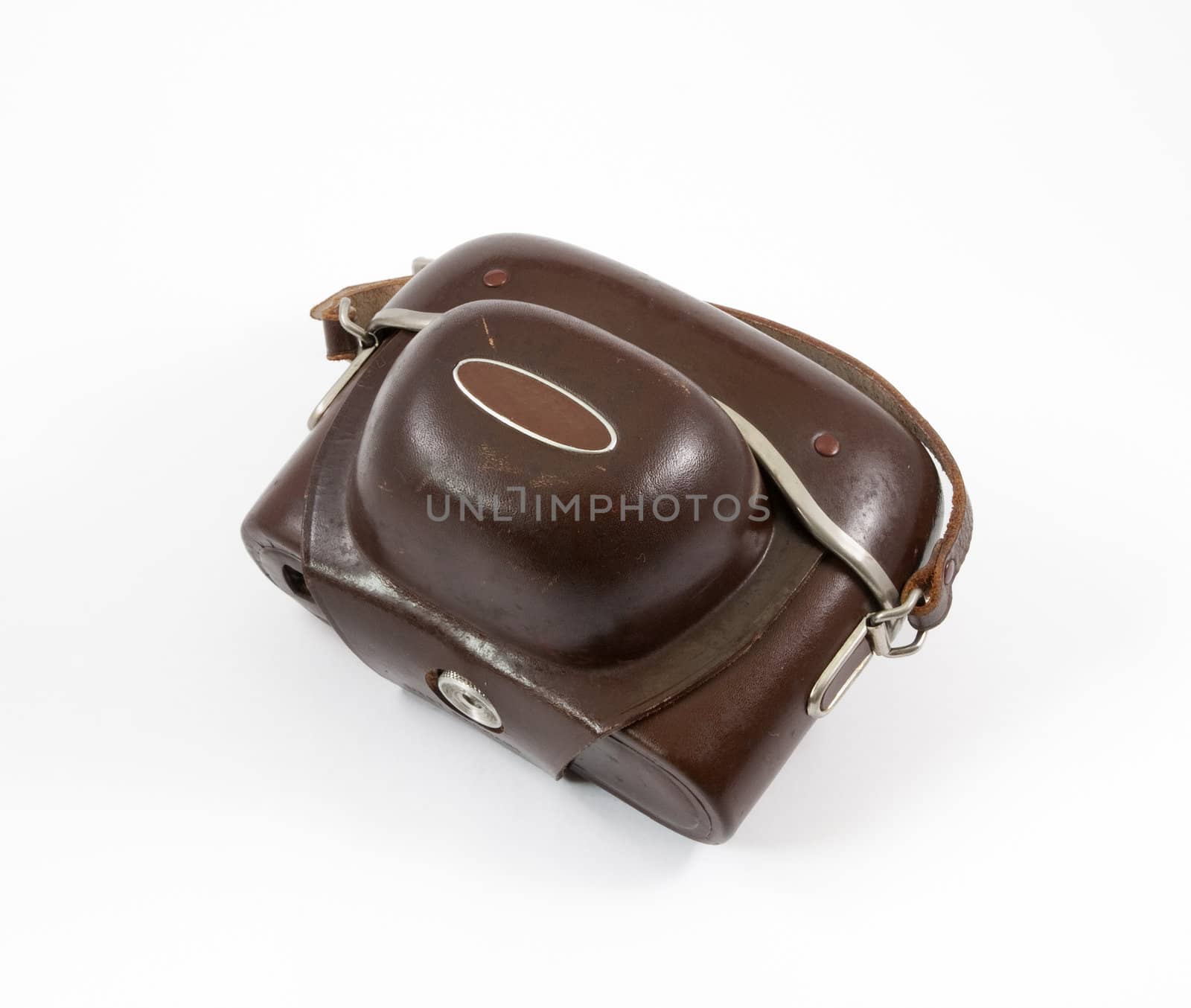 Old camera in a leather case on a white background