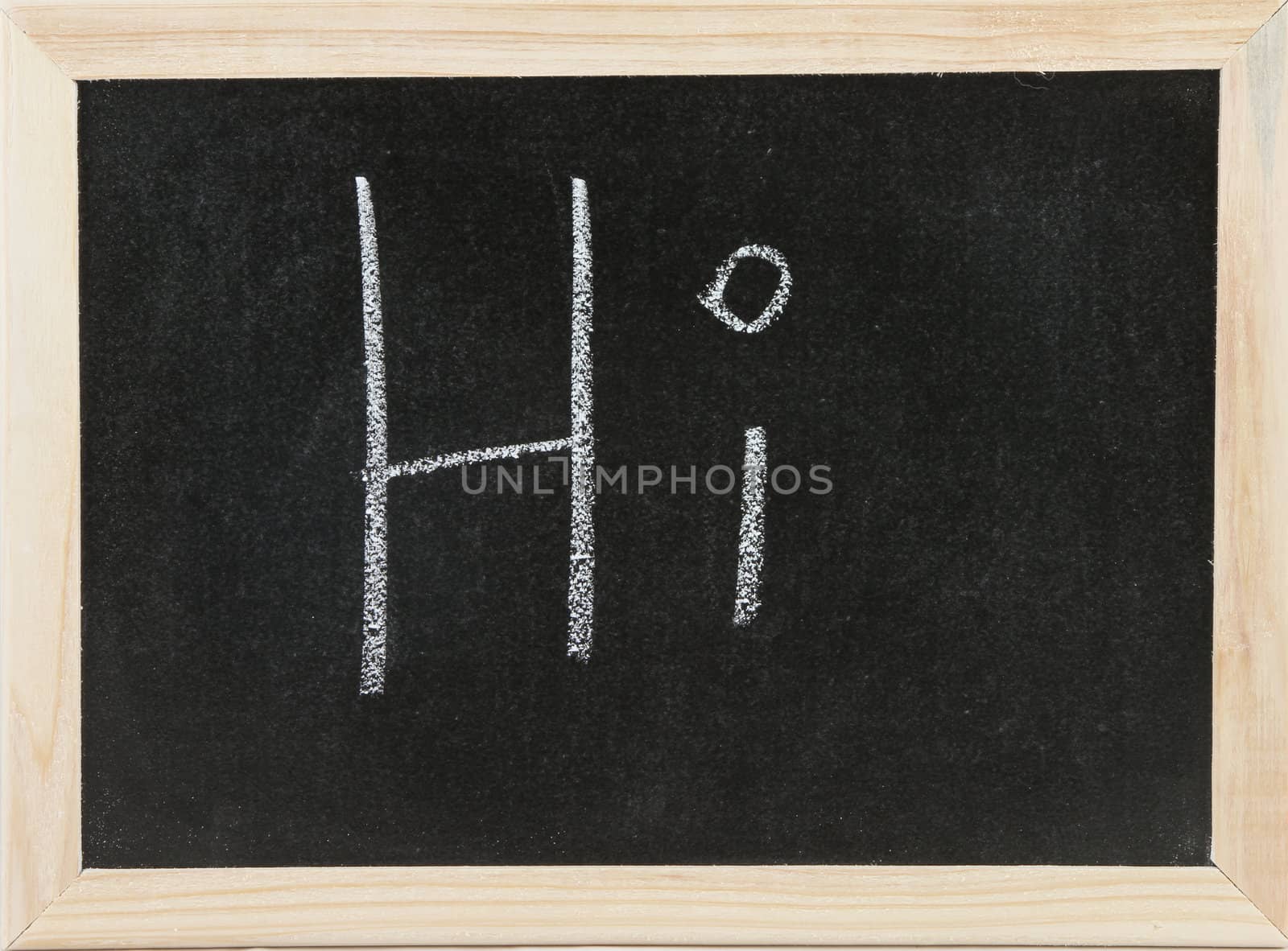 Black chalk board with wooden framed surround with the word Hi.