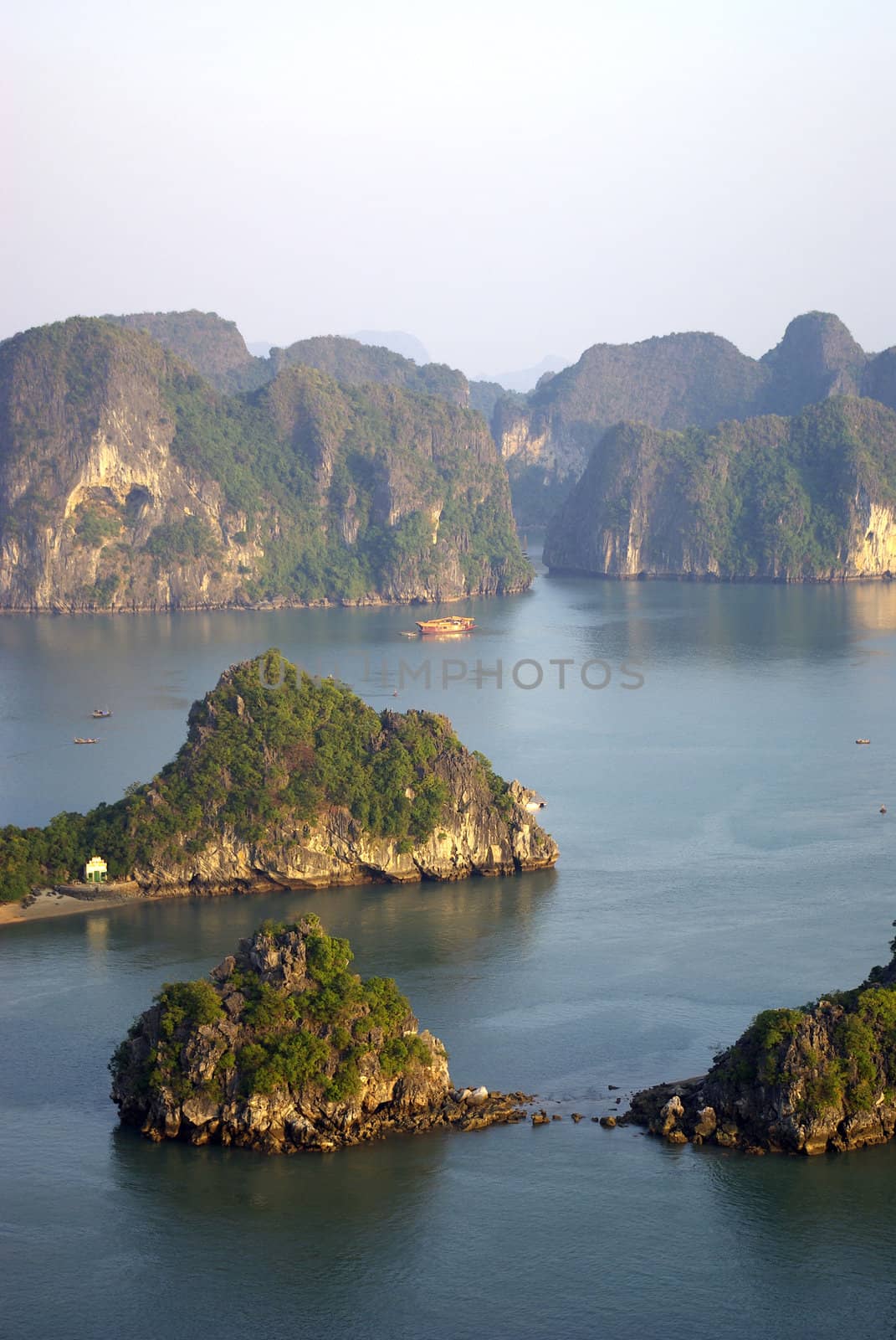 This is a beautiful view of Halong bay in Vietnam at the end of afternoon