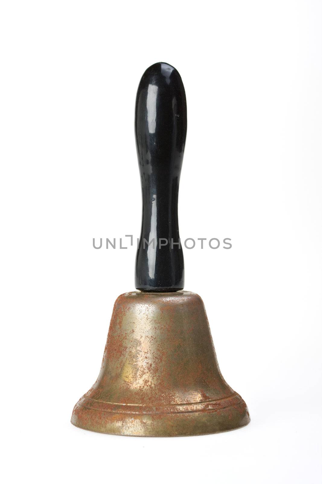 closeup of a small bell on white by bernjuer