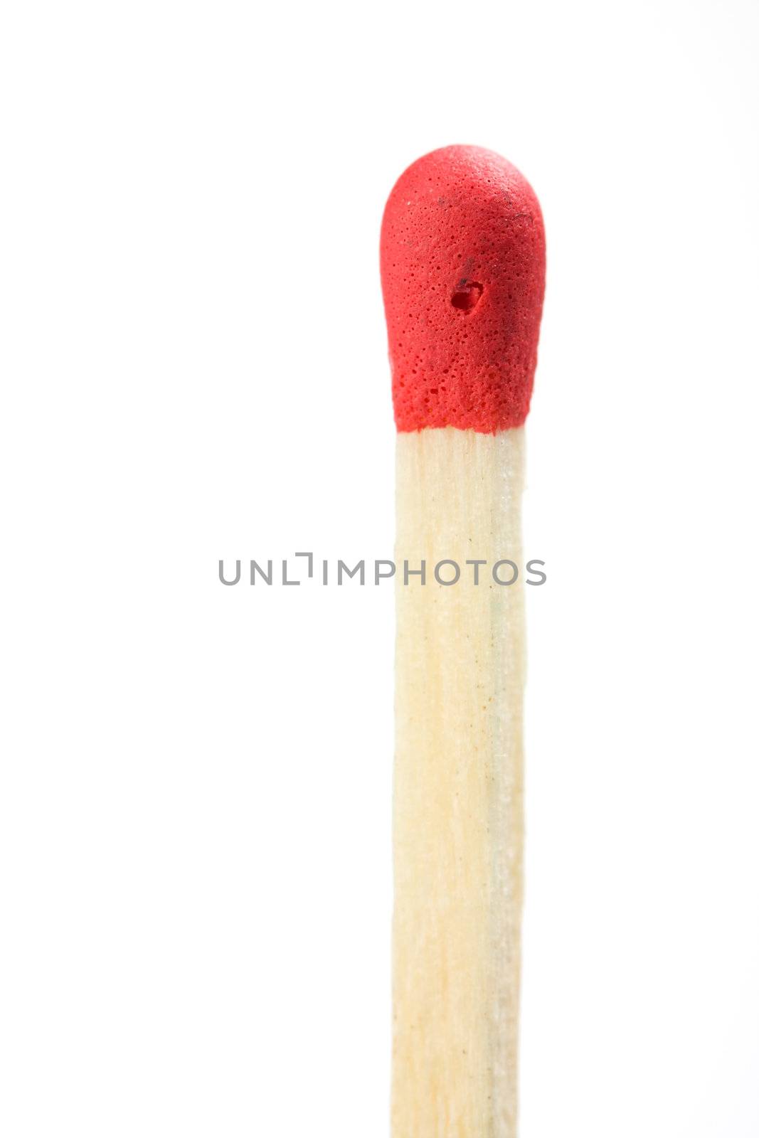 closeup of a match isolated on white by bernjuer