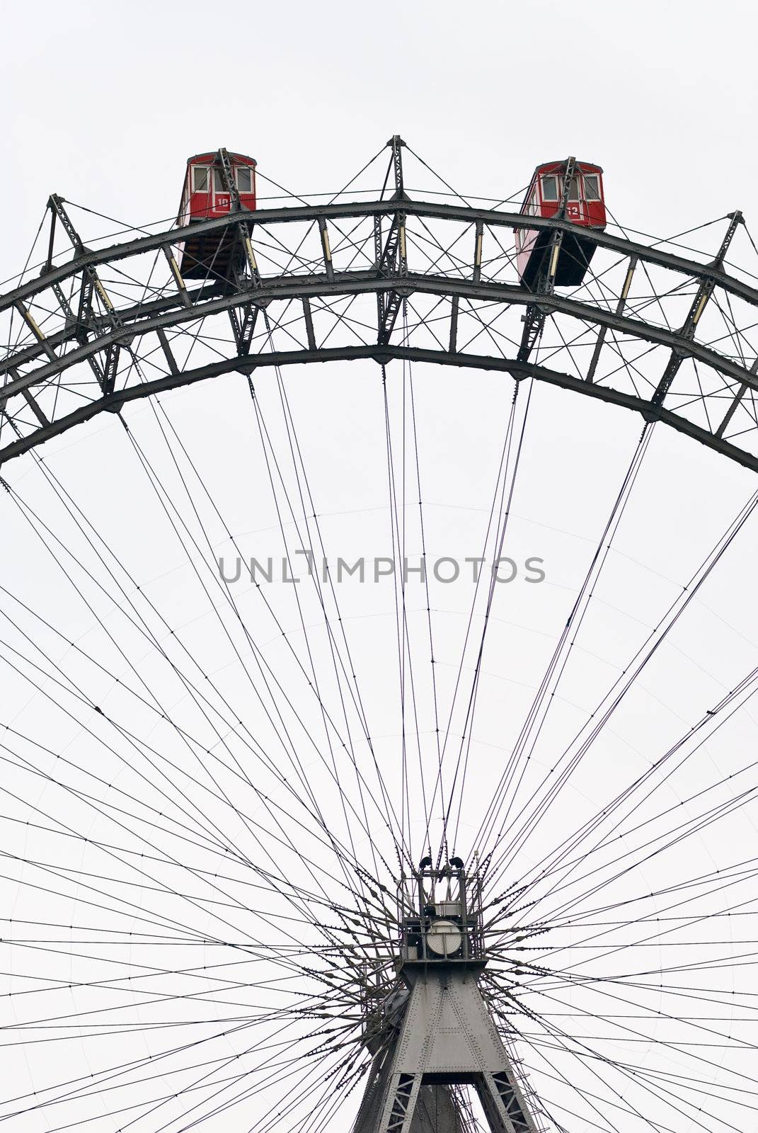 the viennese giant wheel is a ferris wheel in the famous austrian amusement park prater. it is about 60 meters high and was designed by walter basset