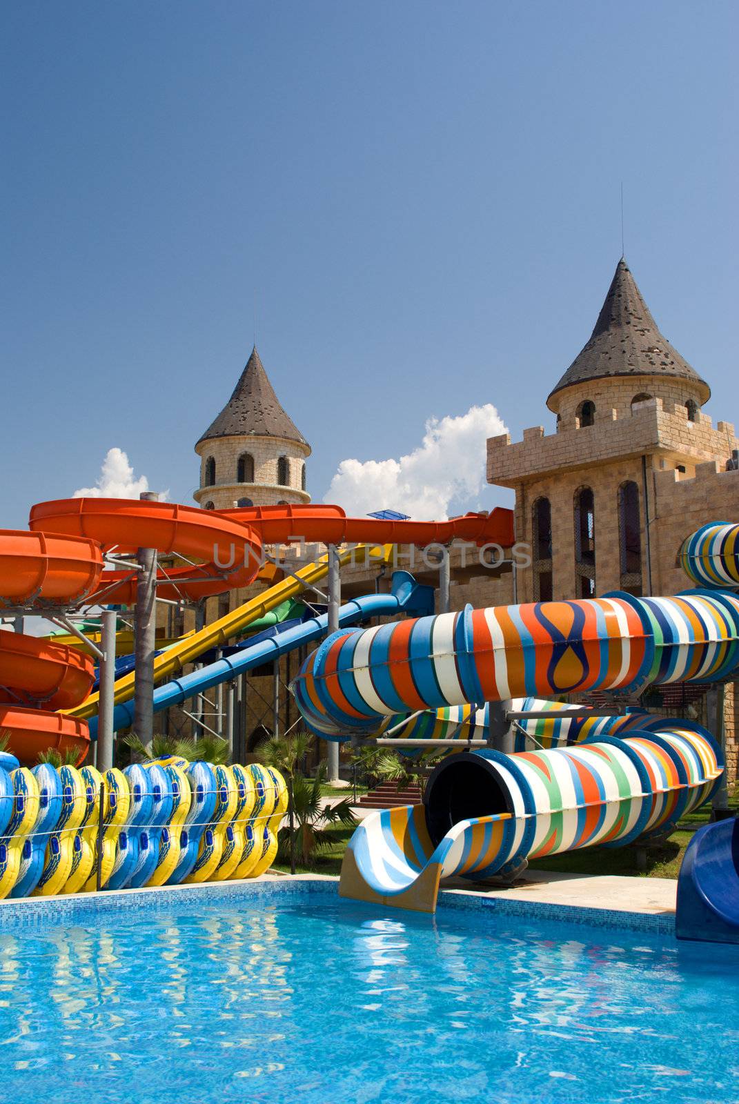 Aqua park in the open air.
Summer, sunny day.