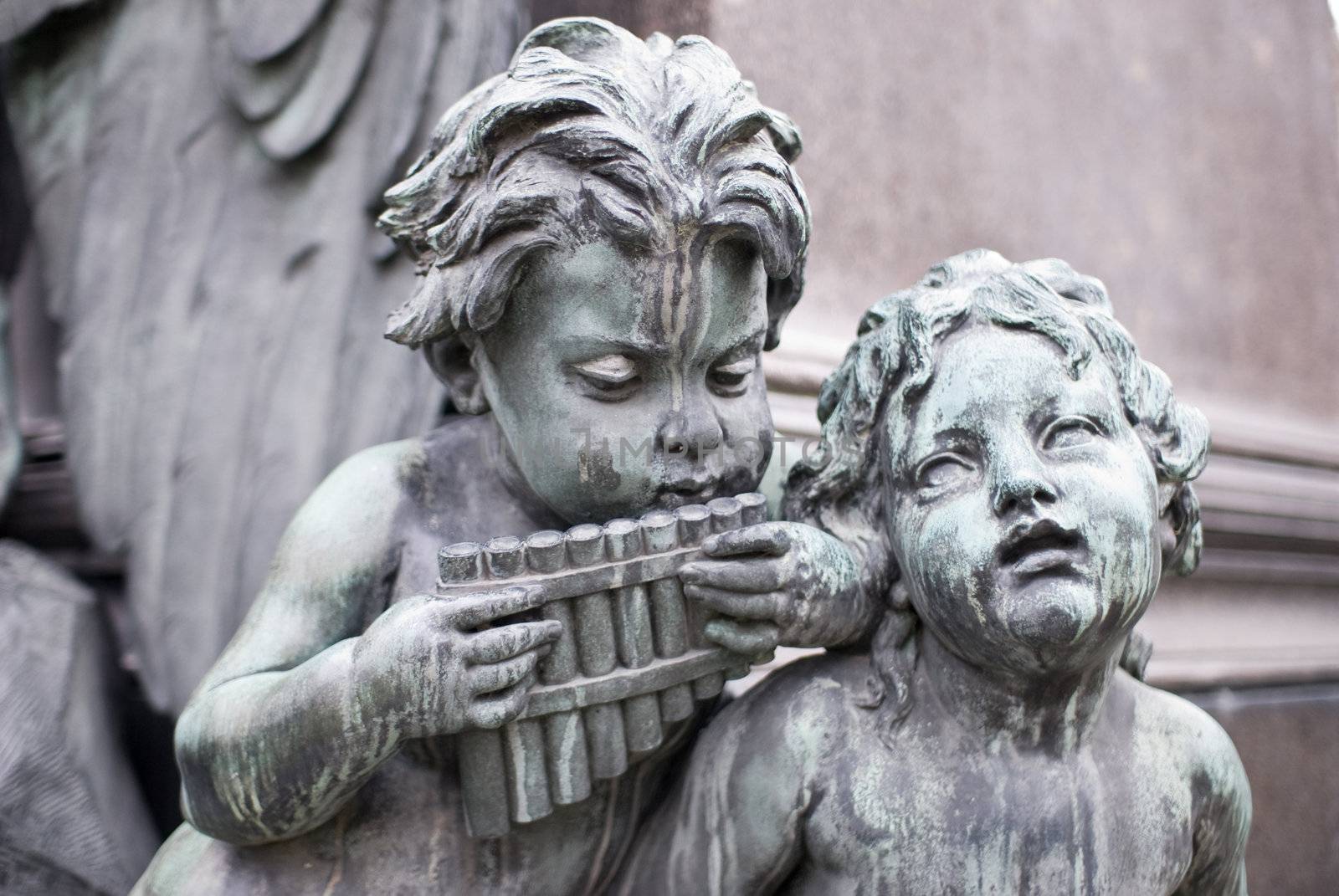 sculptures of musicians around the famous beethoven monument  which is located in the first district of vienna, the capital of austria