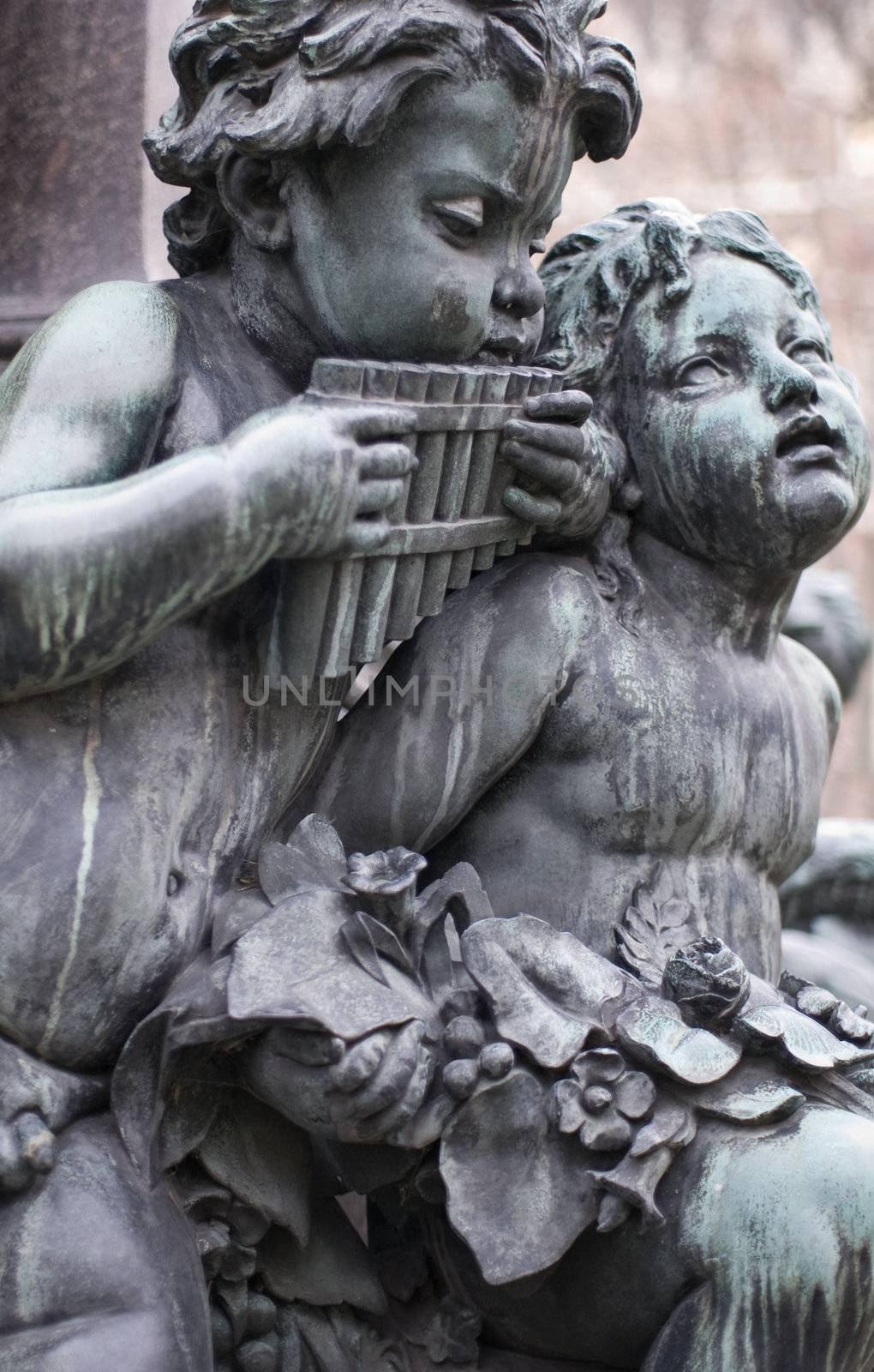 sculptures of musicians around the famous beethoven monument  which is located in the first district of vienna, the capital of austria