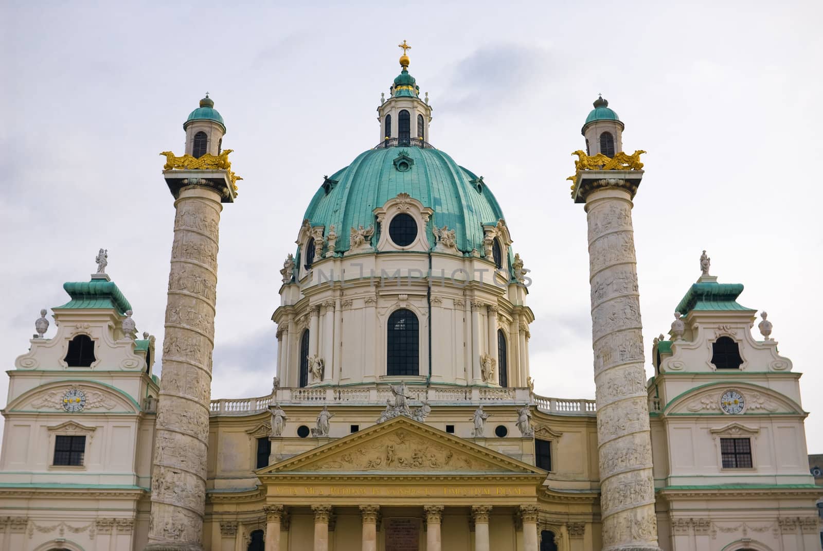 the viennese st. charles church is located at the karlsplatz in the first district of vienna near the ringstrasse. the architecture style is baroque.