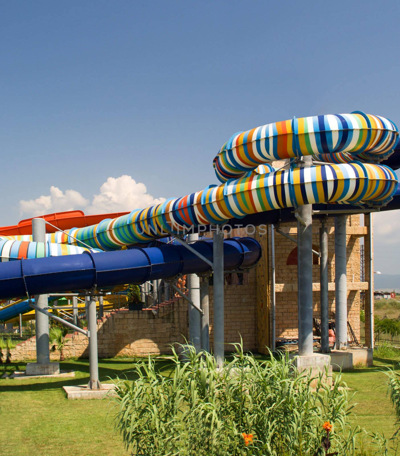 Aqua park in the open air.
Summer, sunny day.