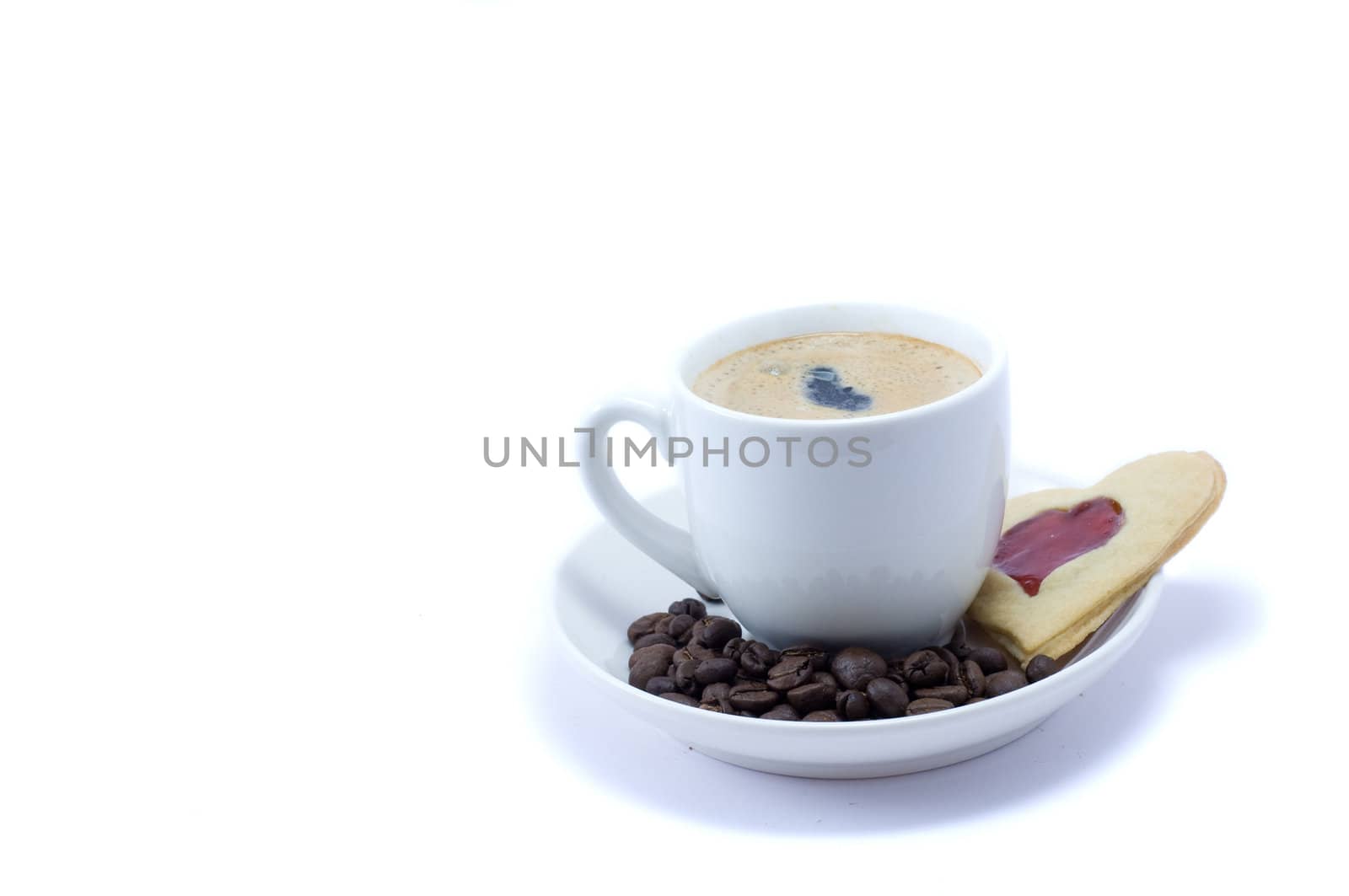 Cup of coffe with cookie and granules