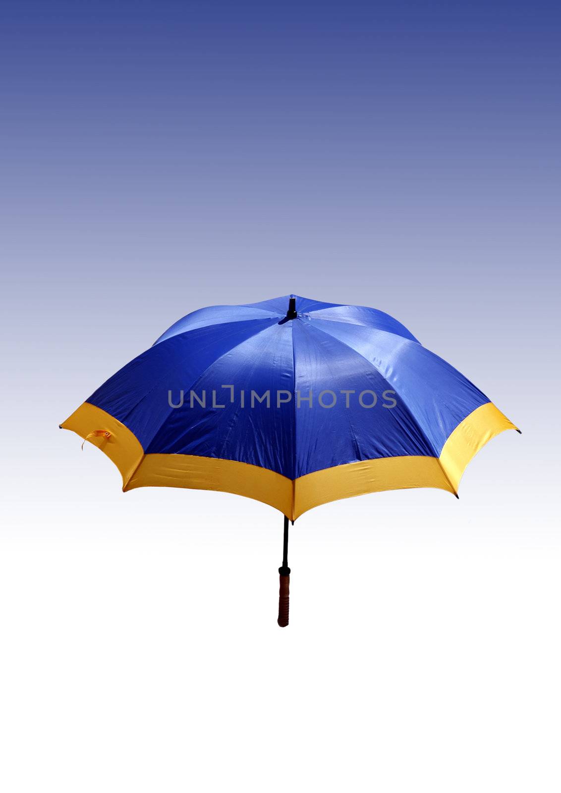 Blue - yellow beach umbrella on a white - blue background