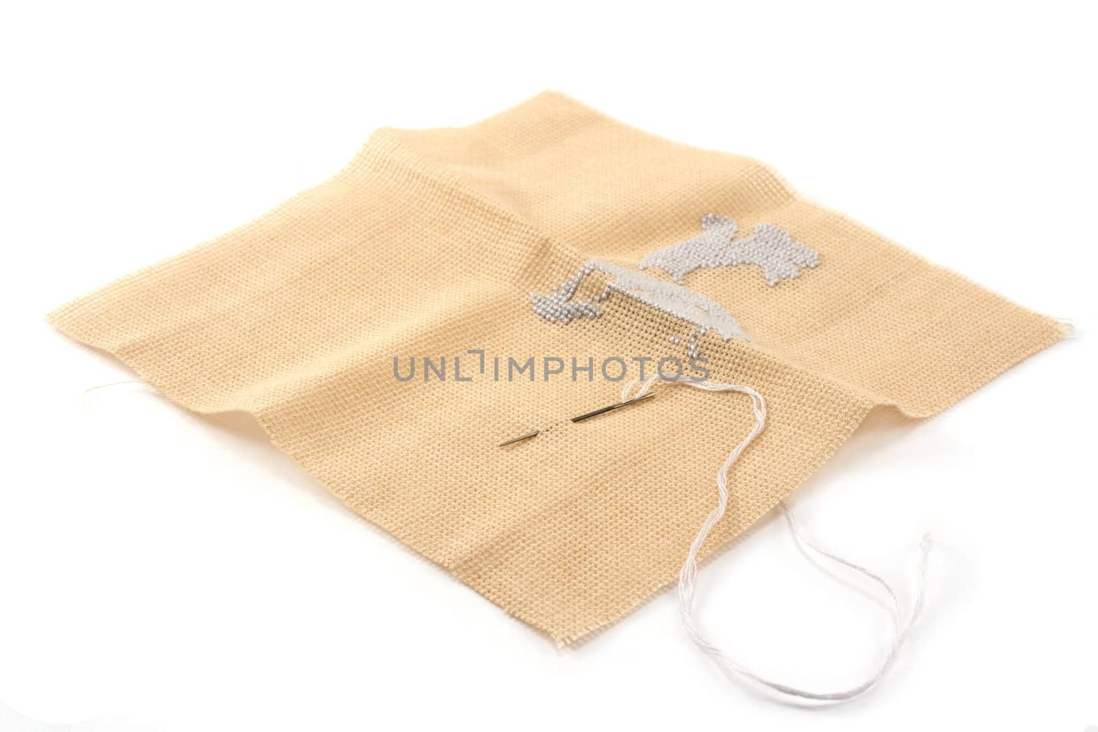 Fabrics, flax, needle with thread, embroidery, beige
