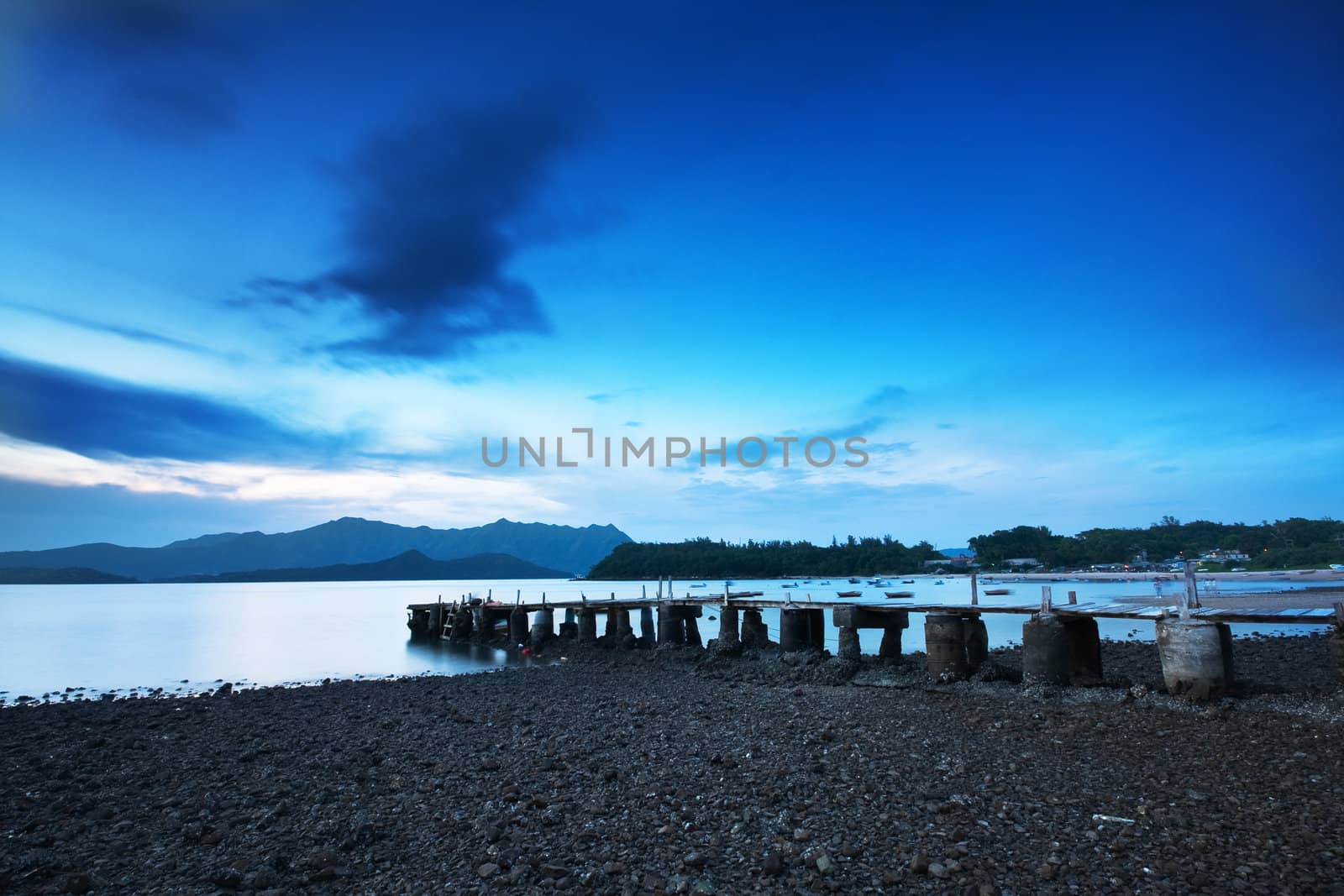 Pier and the sea at sunrise