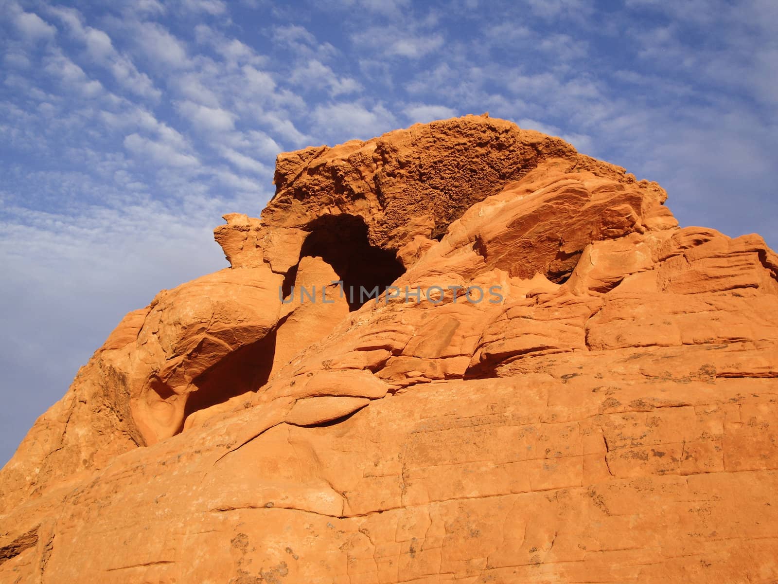 Orange sandstone rock  on blue desert sky