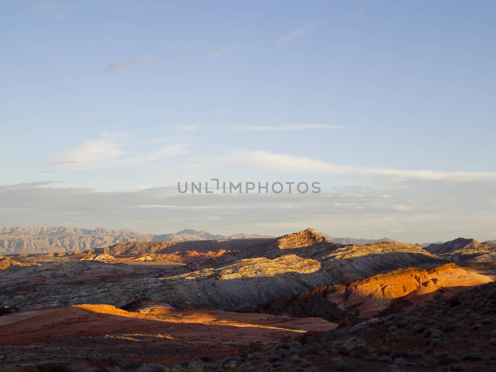 Vista of vast desert landscape in dusk glow
