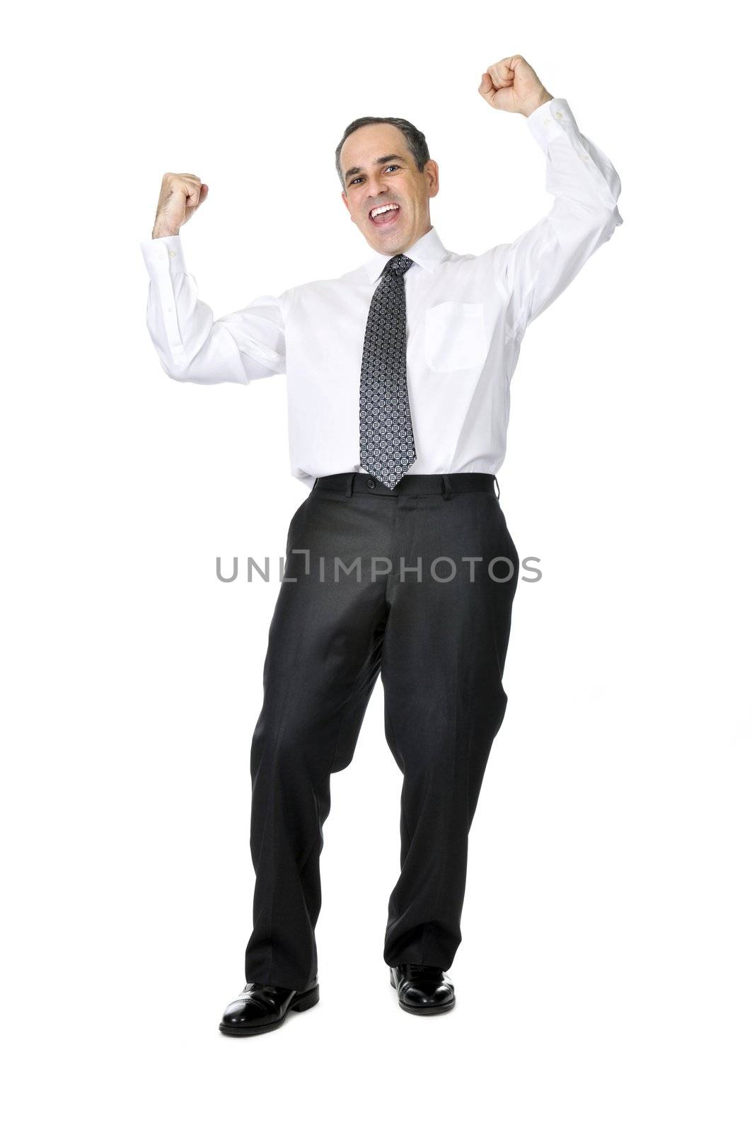 Happy celebrating business man in suit isolated on white background