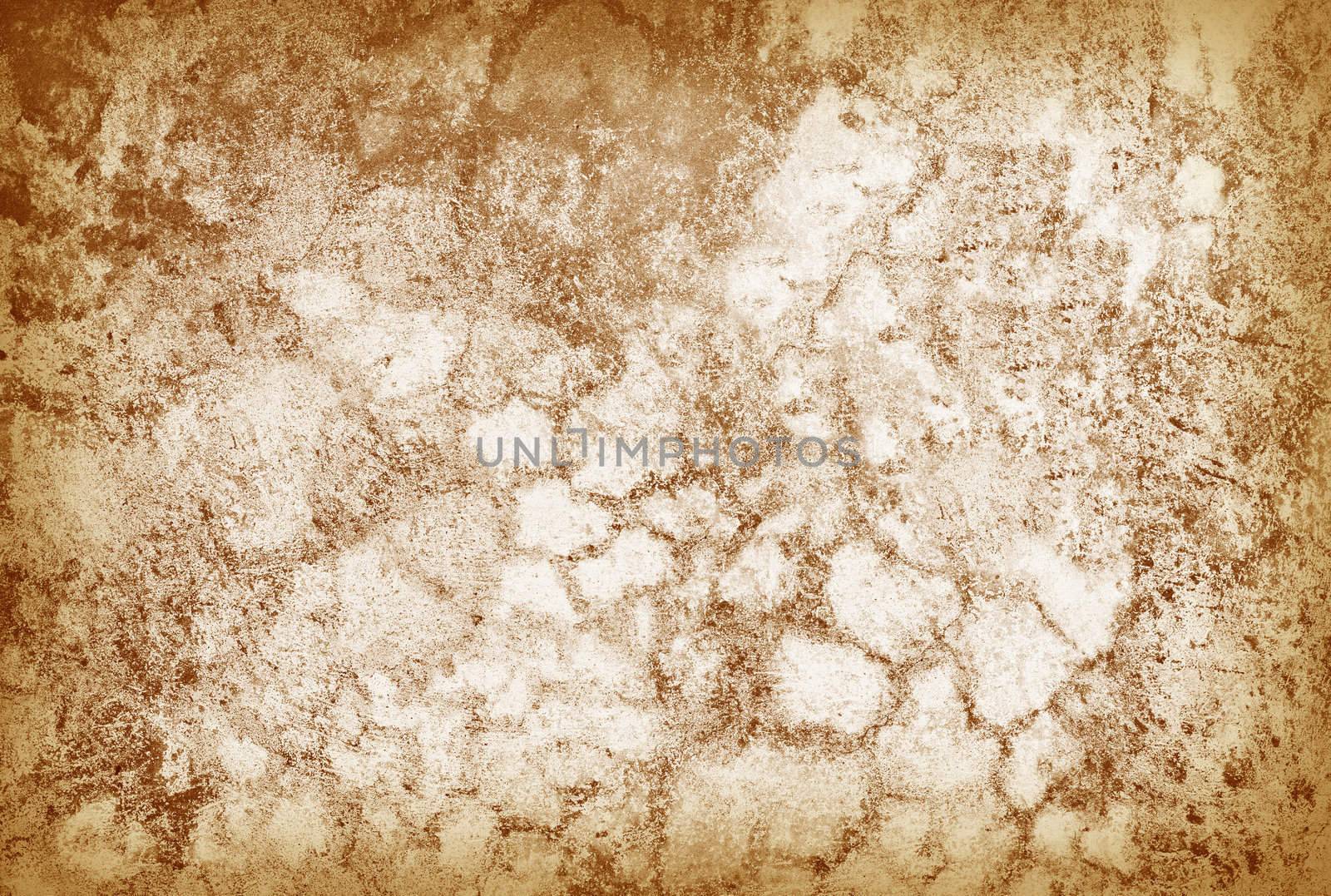 The old cracked grunge surface of a brown wall - a background