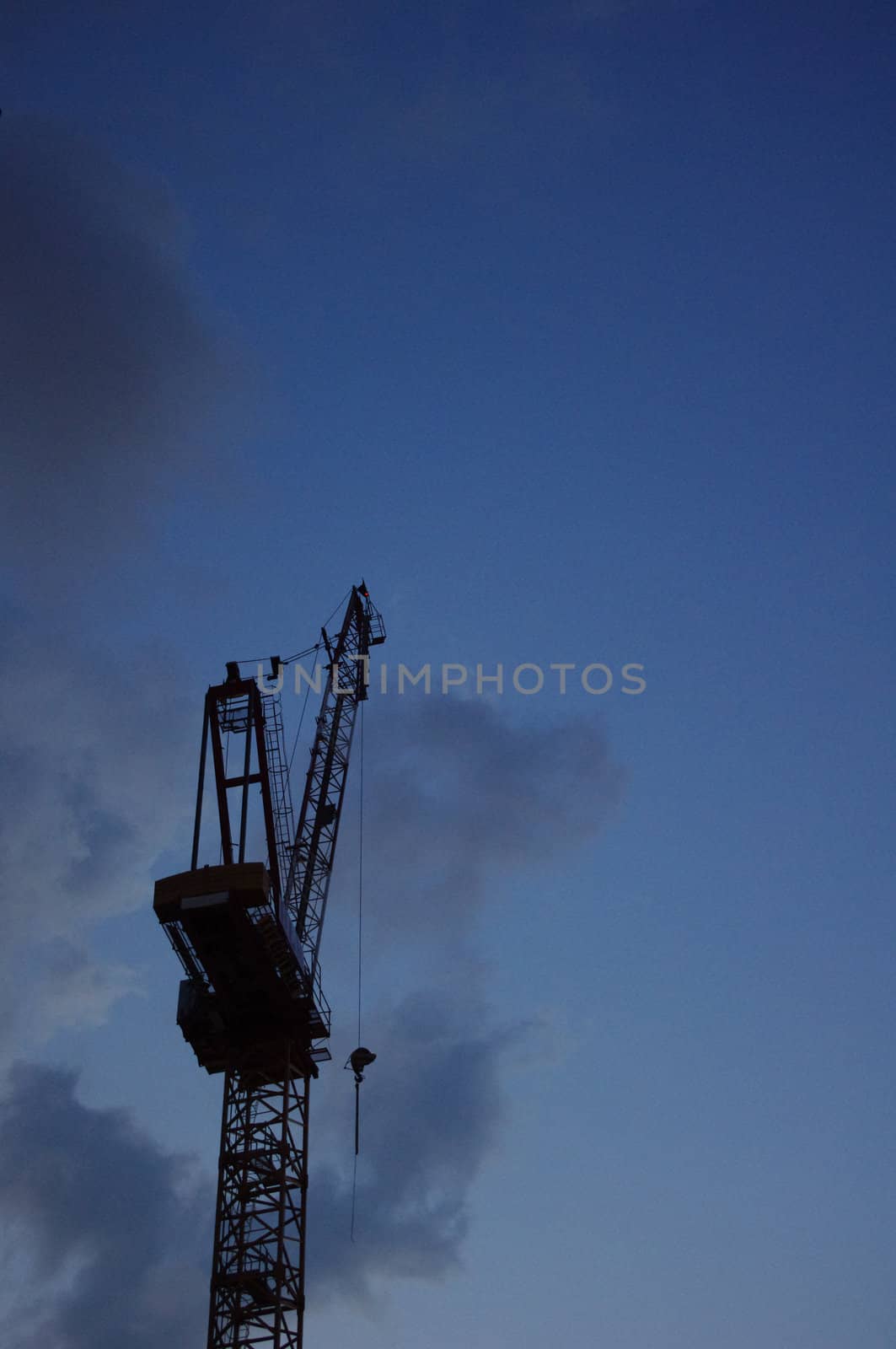 A crane silhouette at twilight