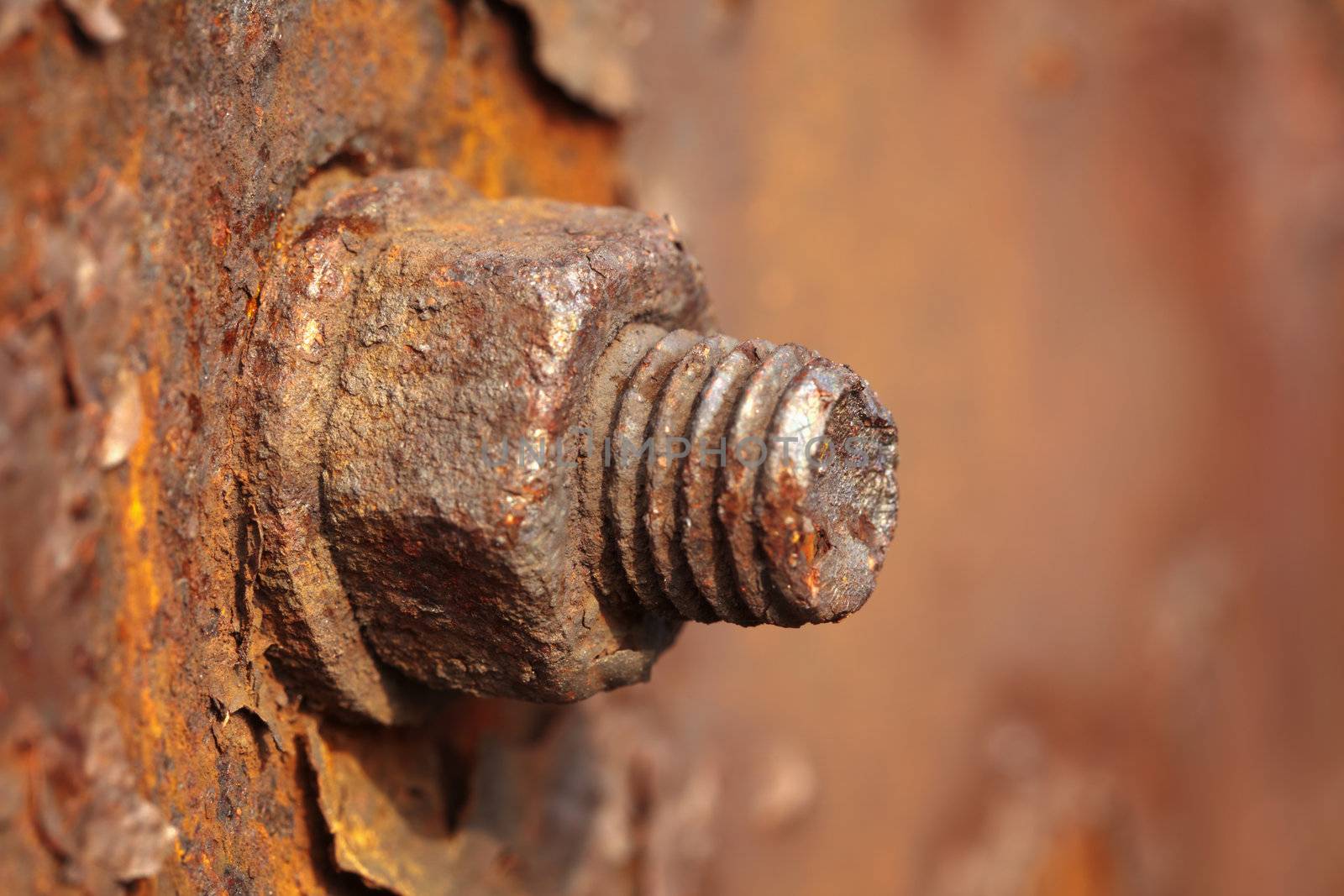 The rusted old iron nut which can't be turned off