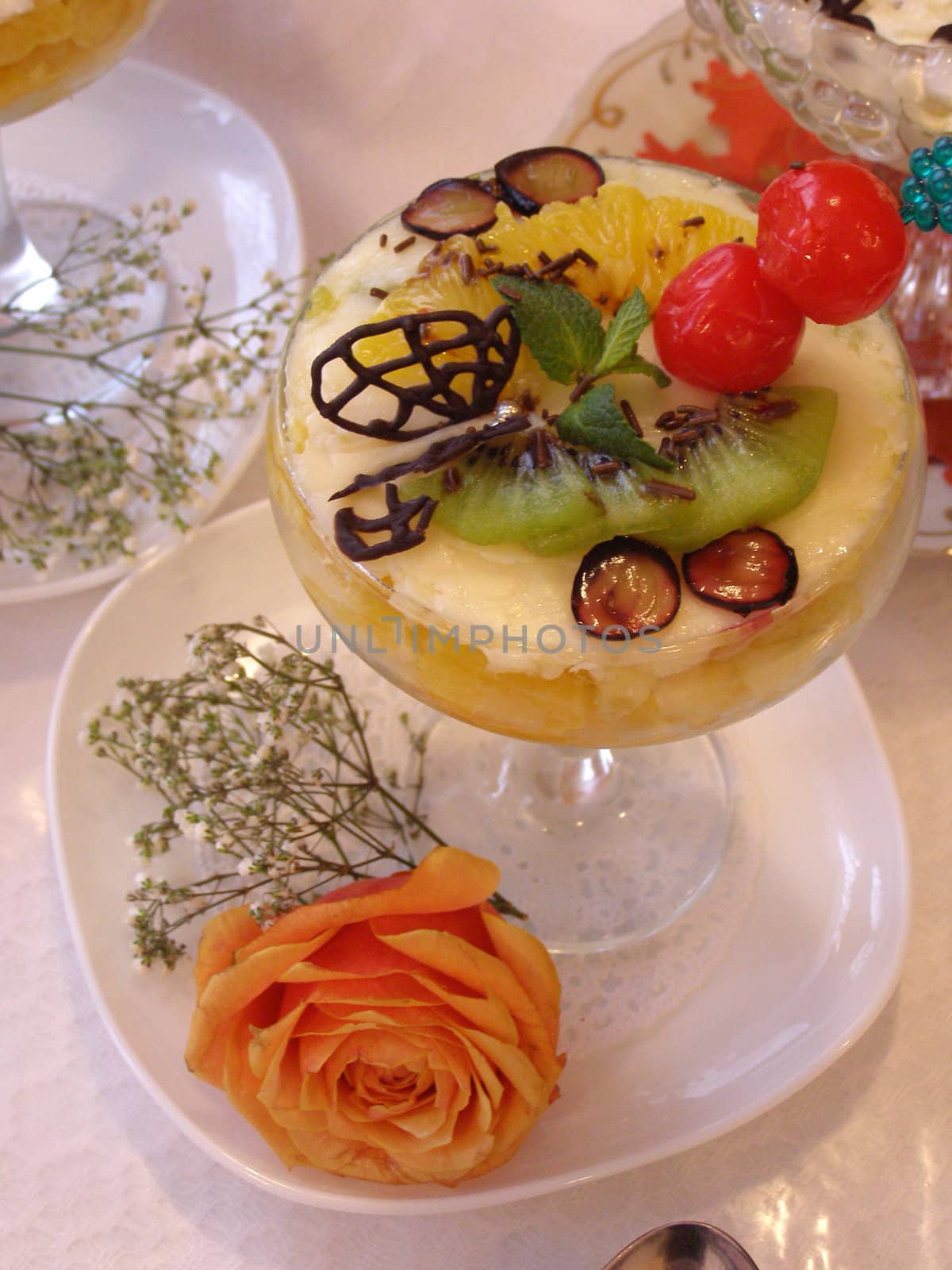 Fruit salad is useful for the organism and quenches well hunger and does not bring harm to figure.
