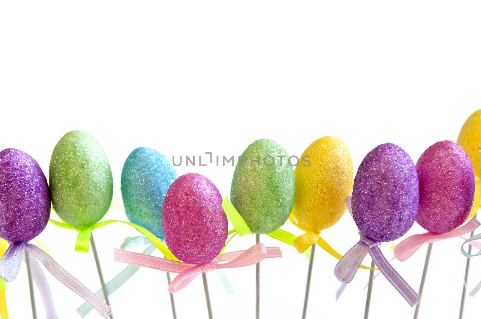 Cute Easter toy eggs isolated on white background