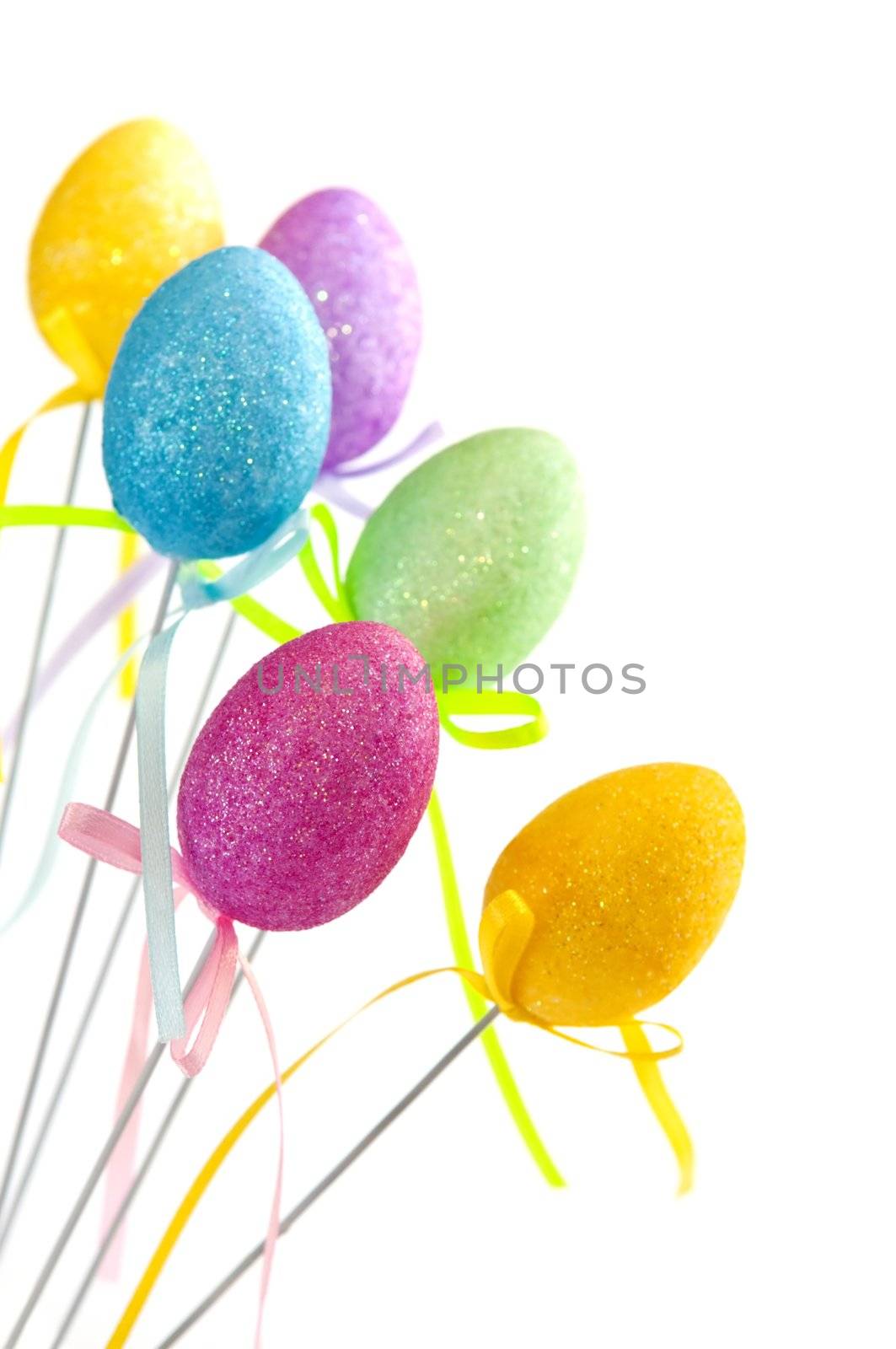 Cute Easter toy eggs isolated on white background