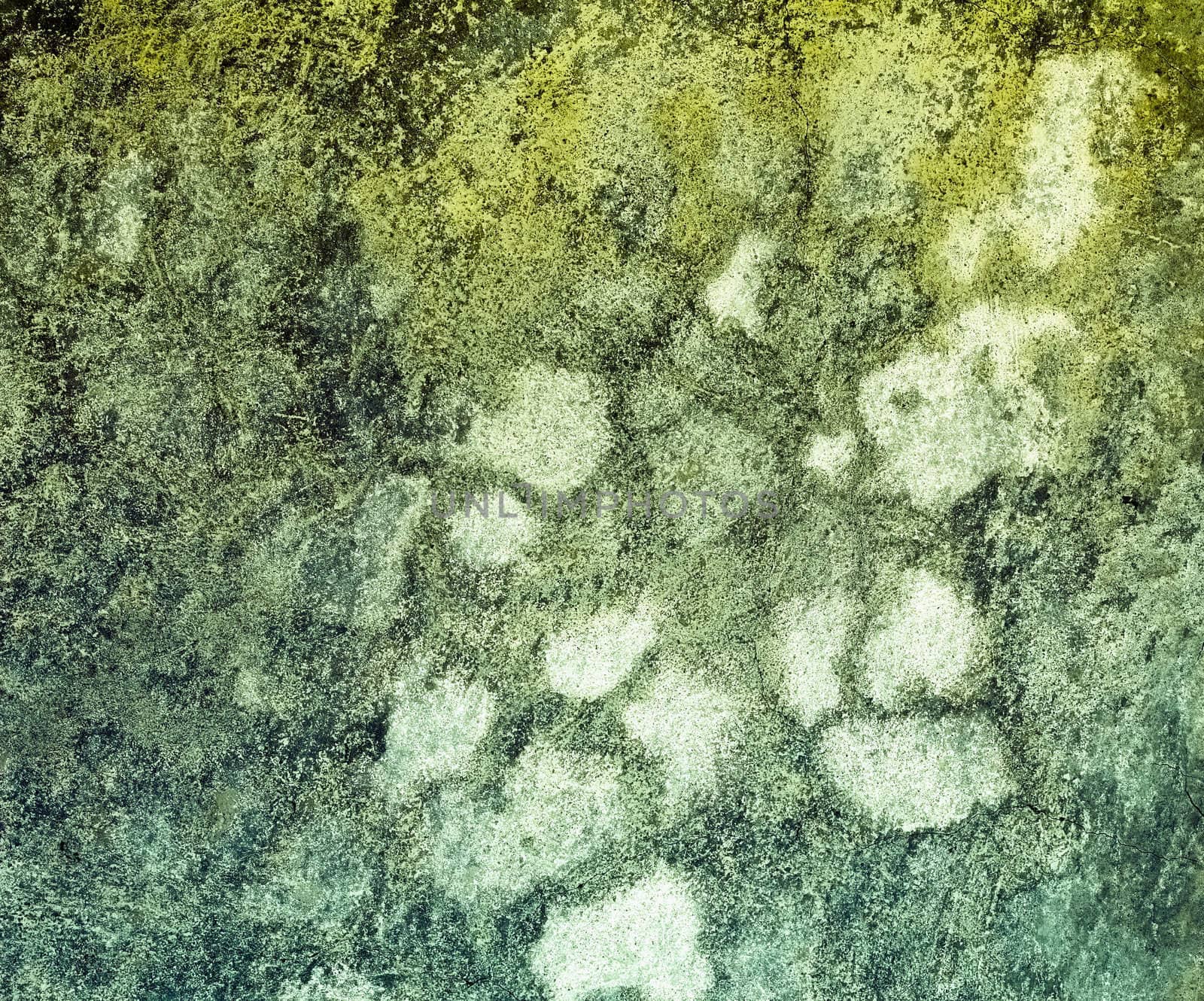 Greenish concrete wall with stains - a background