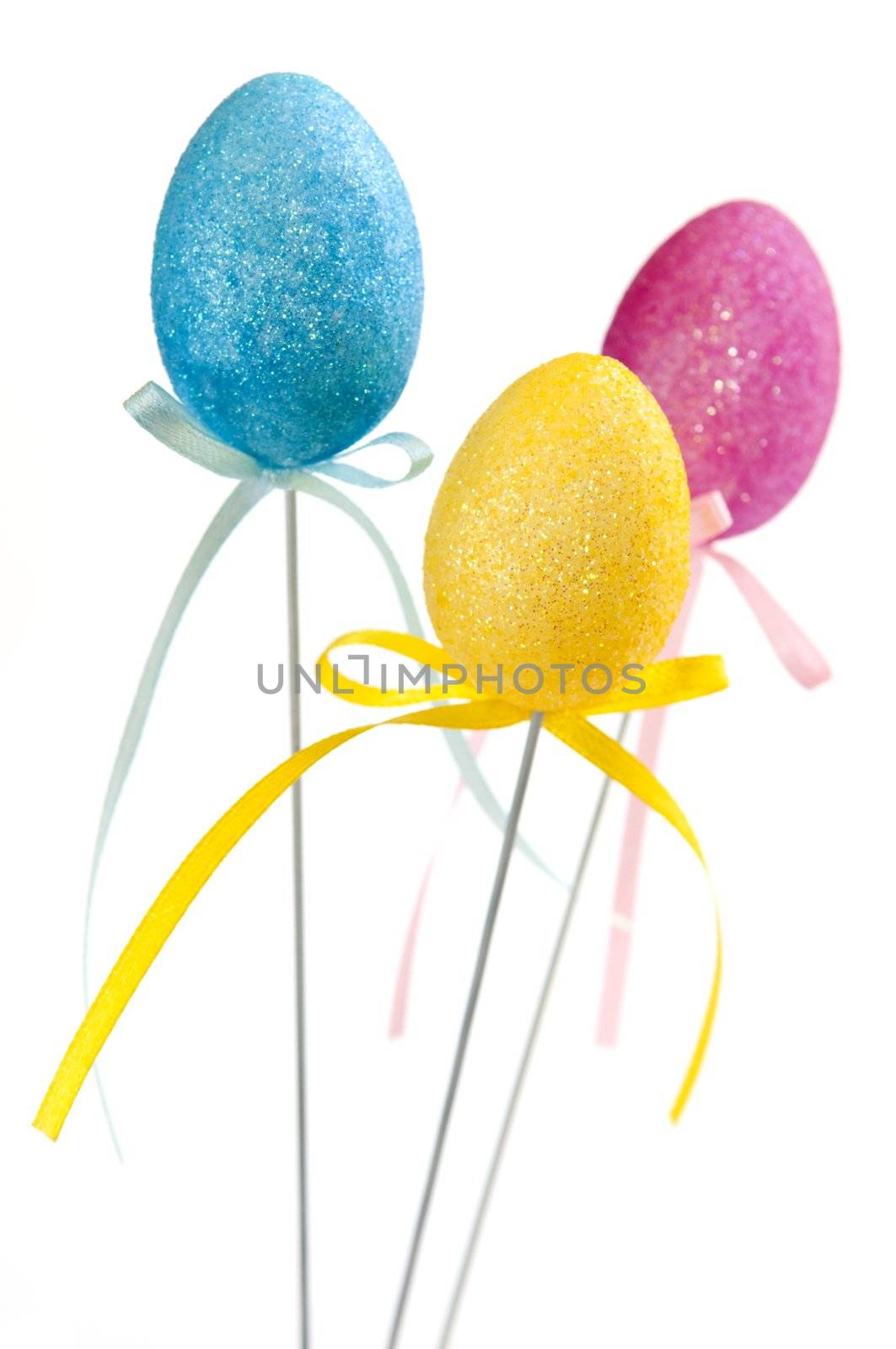 Cute Easter toy eggs isolated on white background