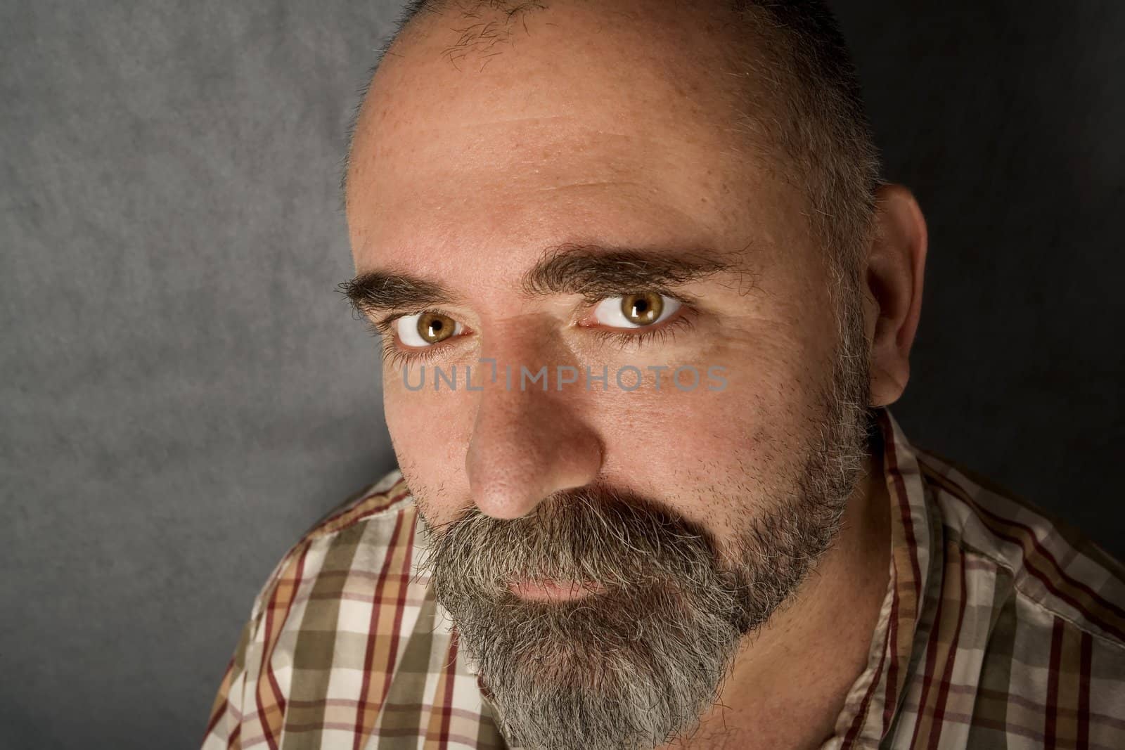 Close up of friendly man in his 40s.