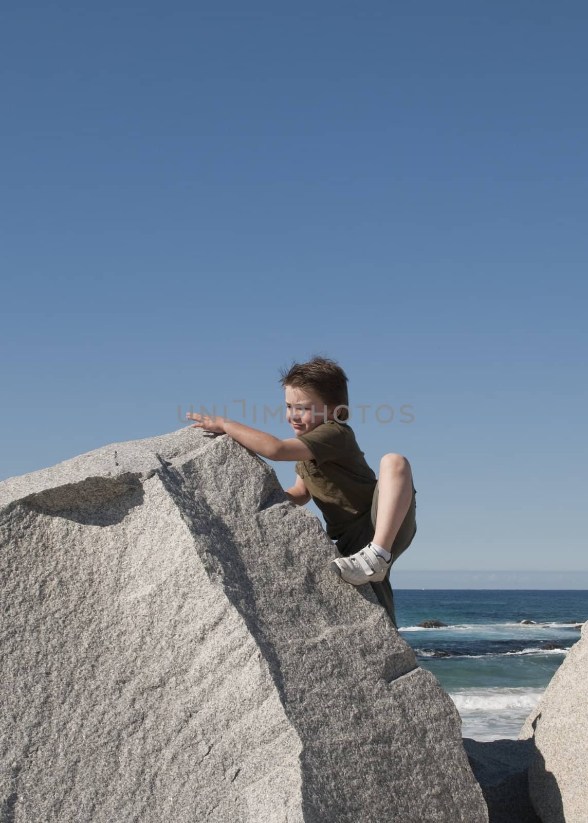 Boy Climbing Rock by tmp