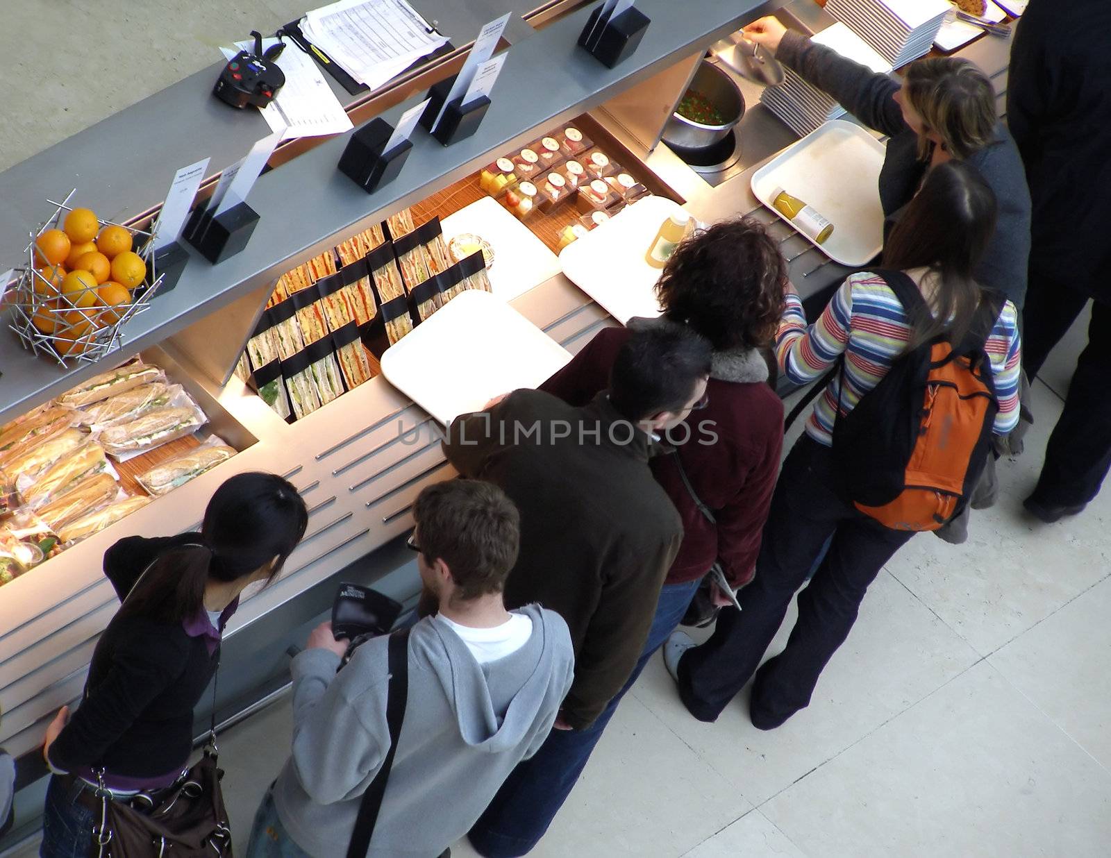 People queuing at a self service bar restaurant