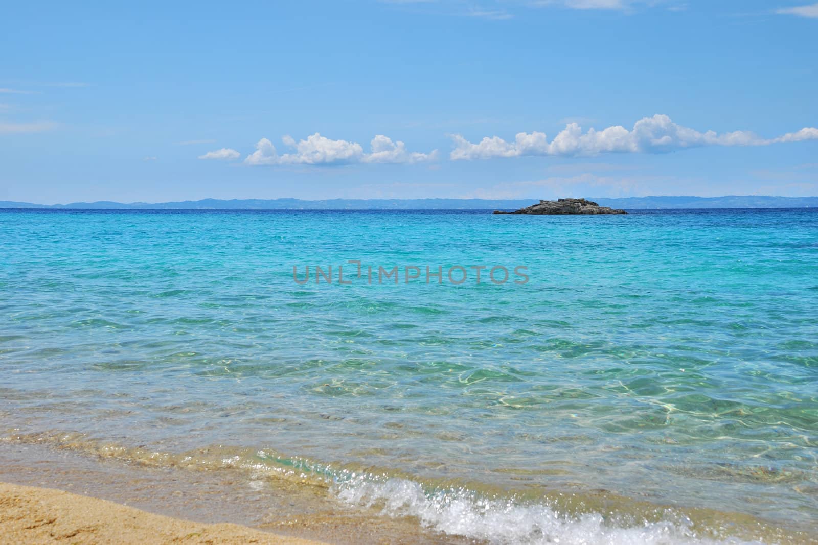 Kalogria beach in Sithonia, Chalkidiki, Greece, with a view on Kassandra peninsula.