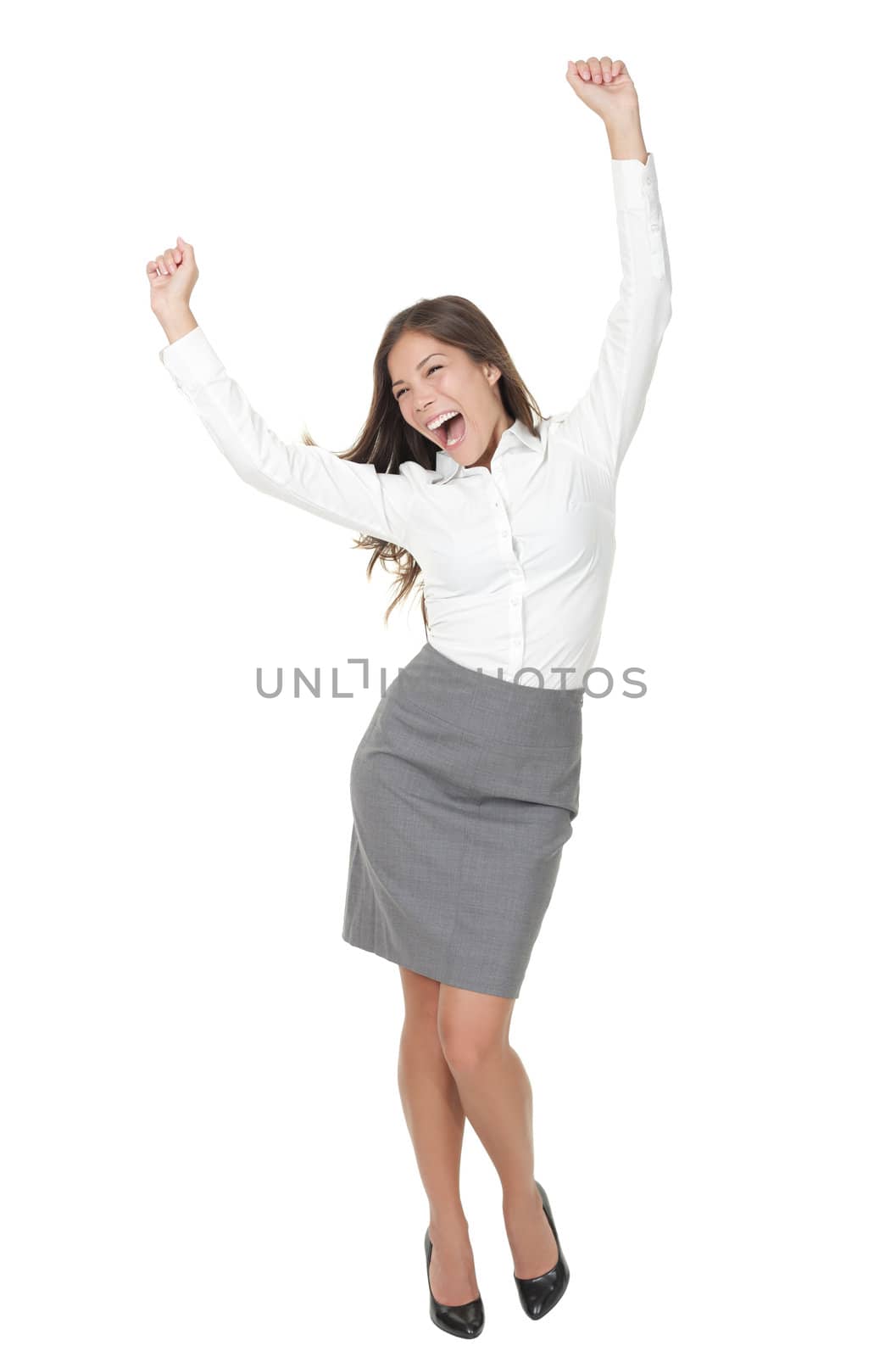 Success woman celebrating in winner dance. Casual young successful businesswoman dancing very happy. Full length Isolated on white background.