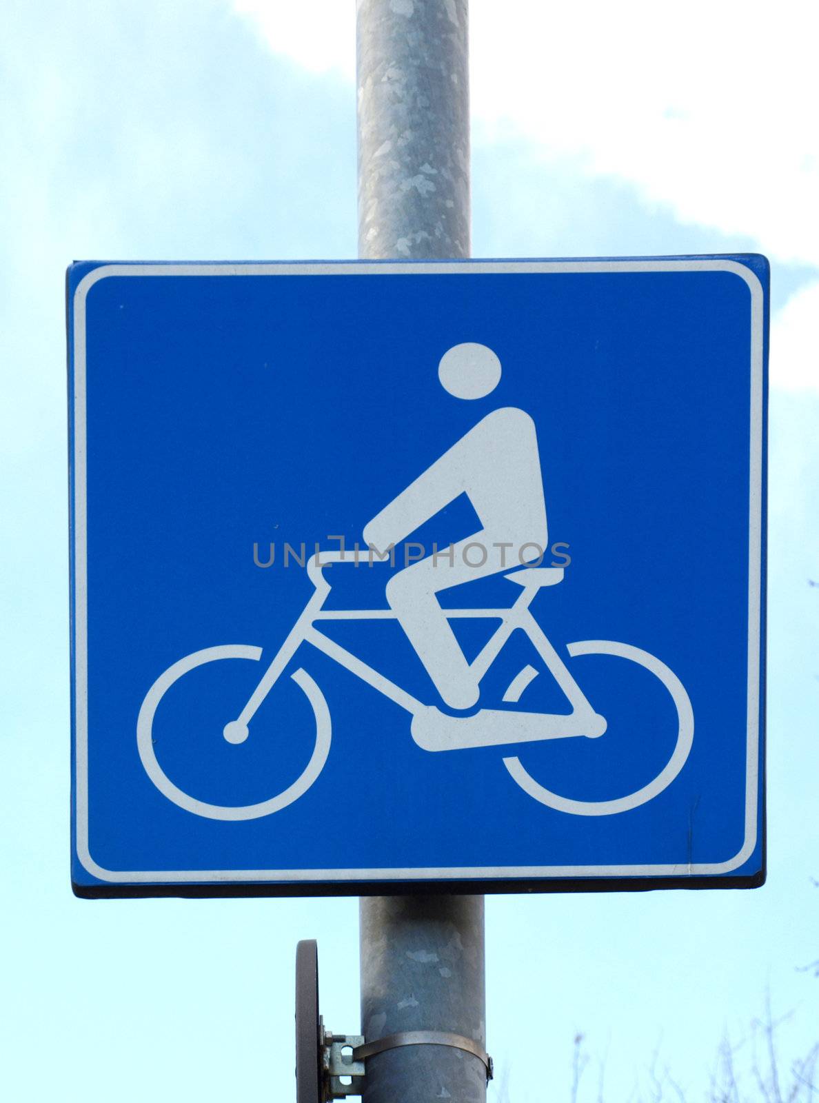 Bike lane traffic sign over blue sky